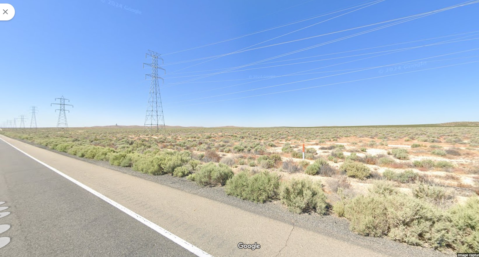 California City, 2.45 acres of land, rides the speed train to Los Angeles. Owner financing $1.00