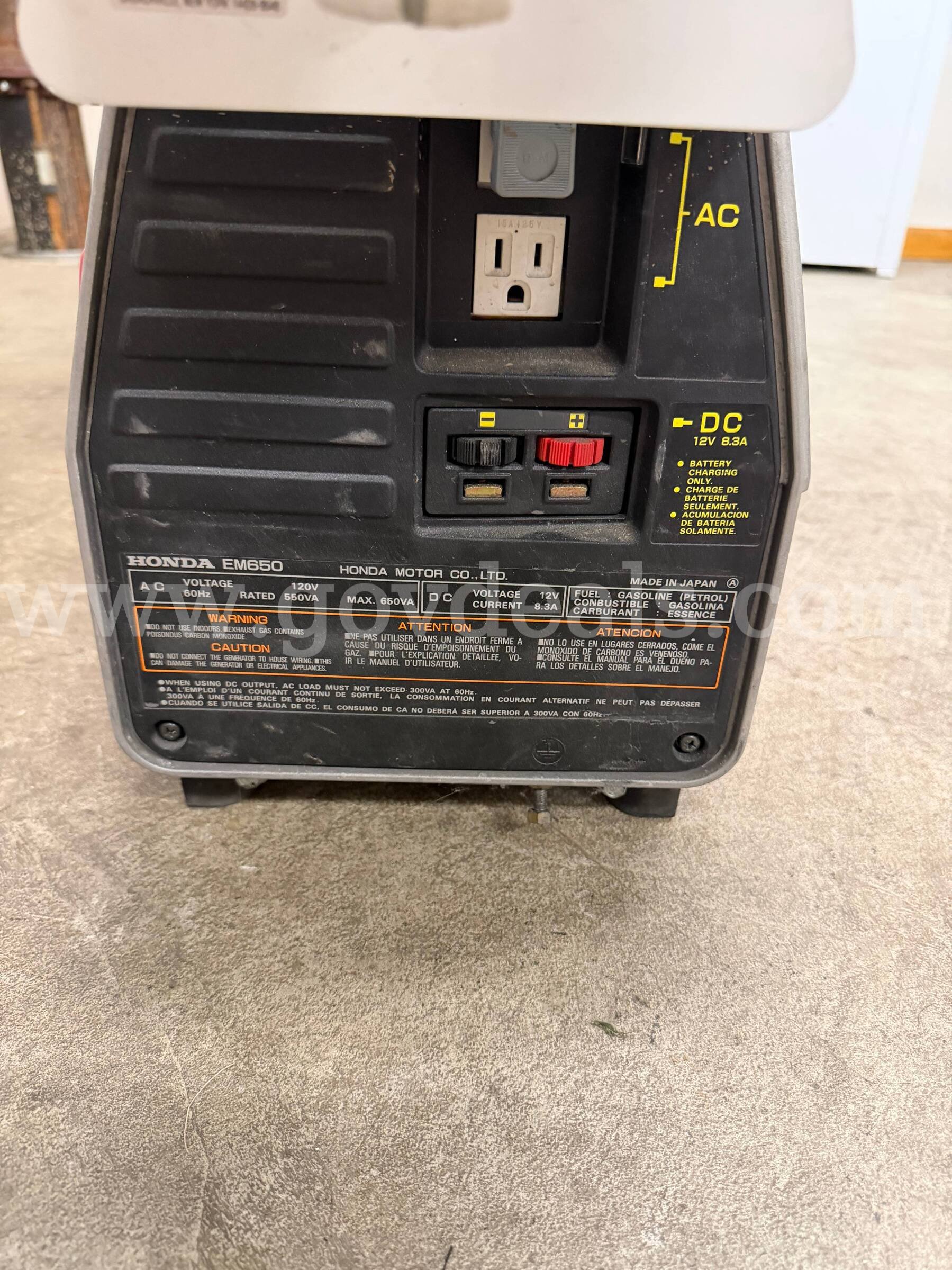 Portable gas generator with attached light Honda EM650 Government Surplus Auction - Photo #5
