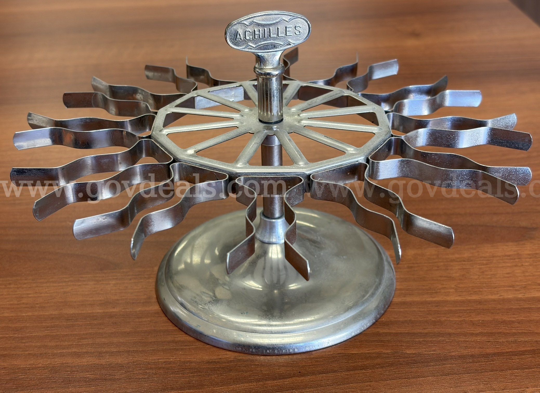 Vintage Achilles rotating rubber stamp carousel in good working condition.