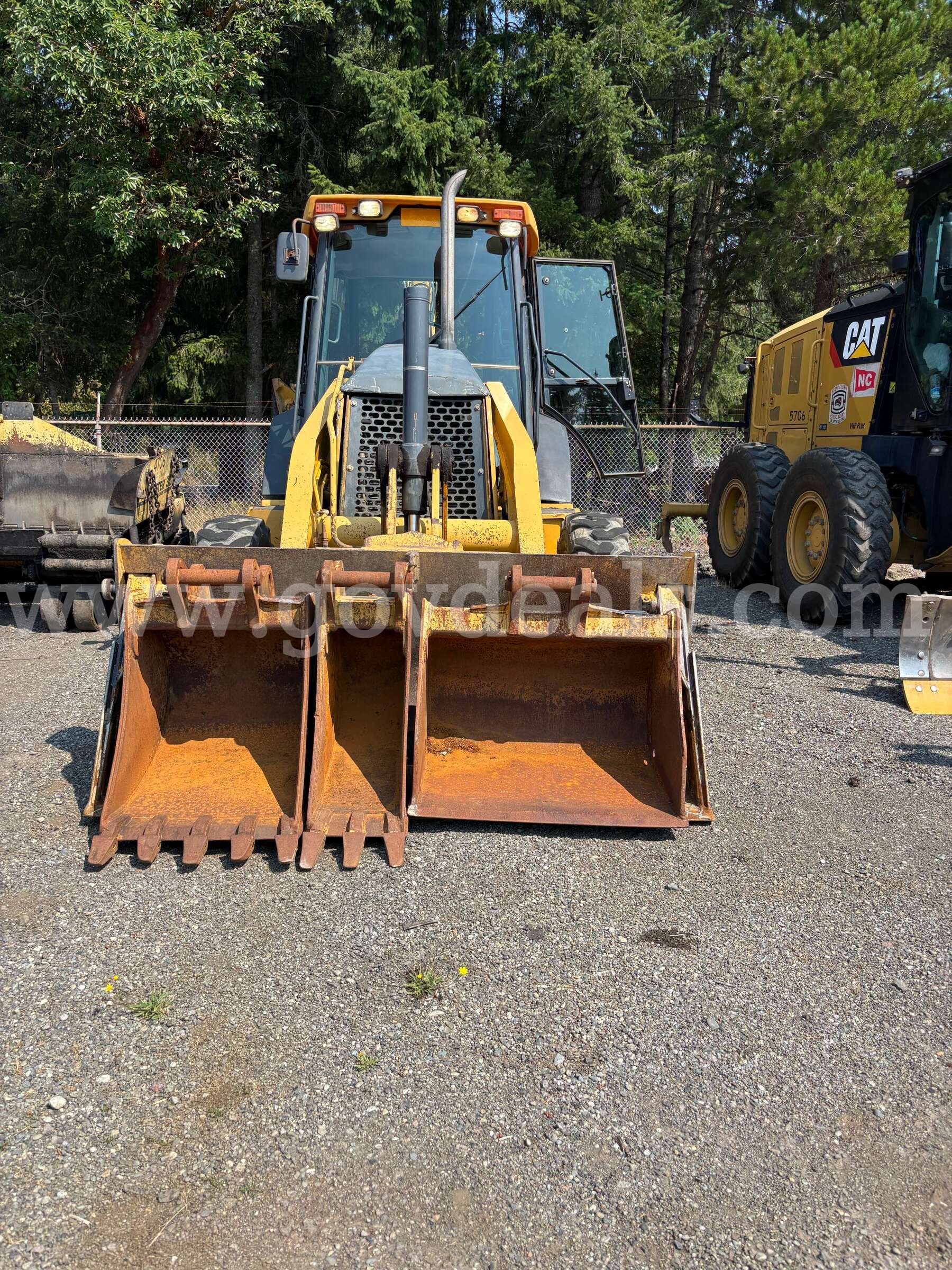 John Deere 310SG Backhoe John Deere 310SG Government Surplus Auction - Photo #2