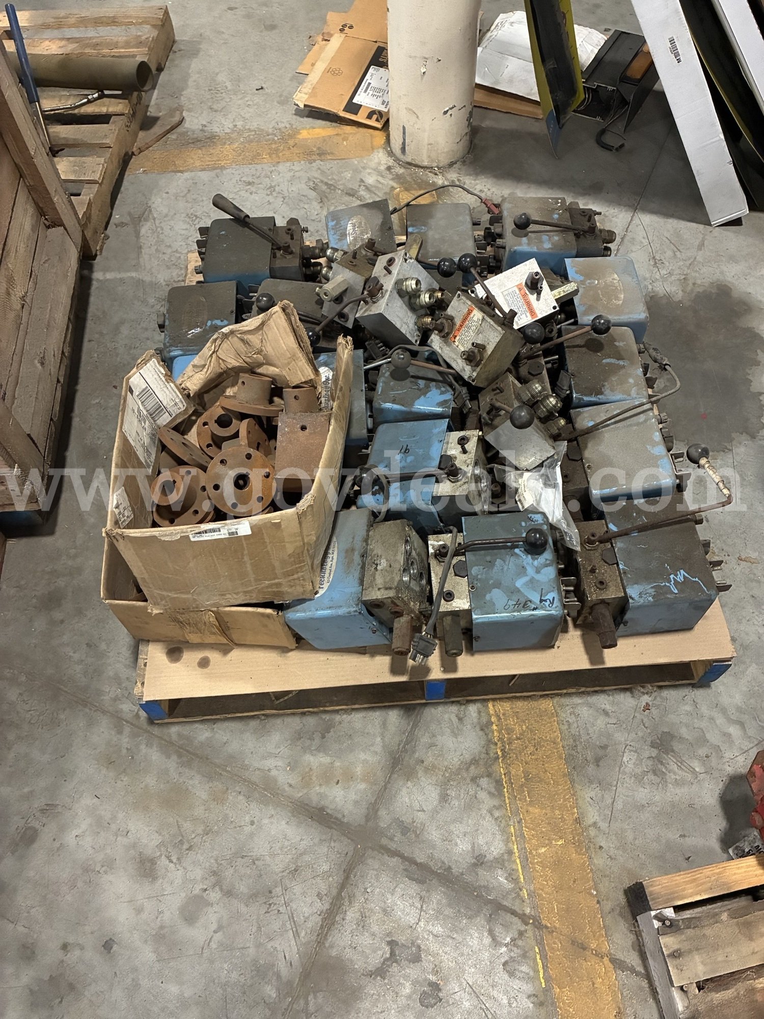Pallet of sander control valves and assorted PTO hub flanges   Government Surplus Auction - Photo #2