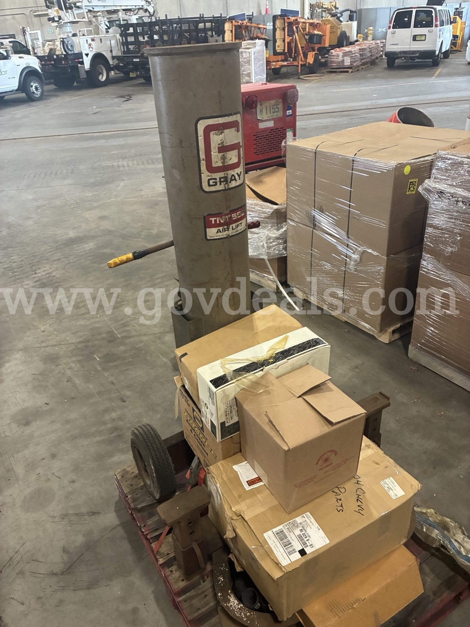 Pallet of a truck bumper jack and assorted truck parts   Government Surplus Auction - Photo #2