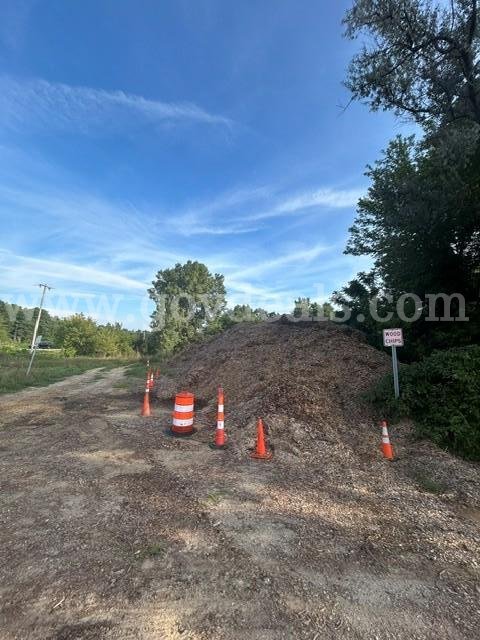 Approximately 788 cubic yards of wood chips located at 11750 Bunkerhill (M-106). We will not load.