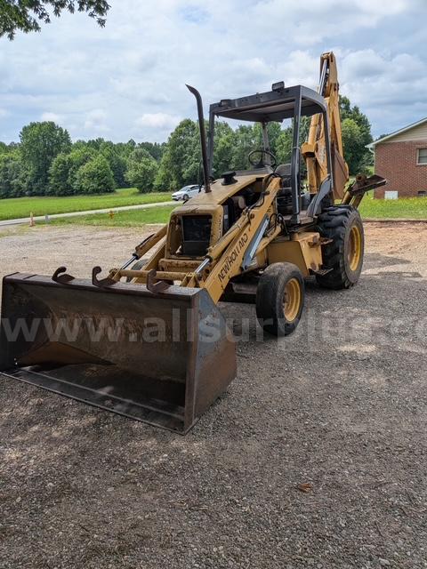 New Holland 555E Backhoe Loader