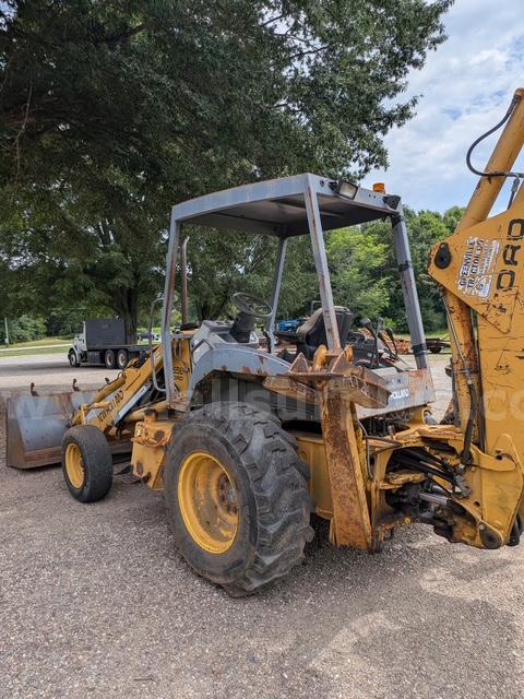 New Holland 555E Backhoe Loader New Holland 555E Government Surplus Auction - Photo #2