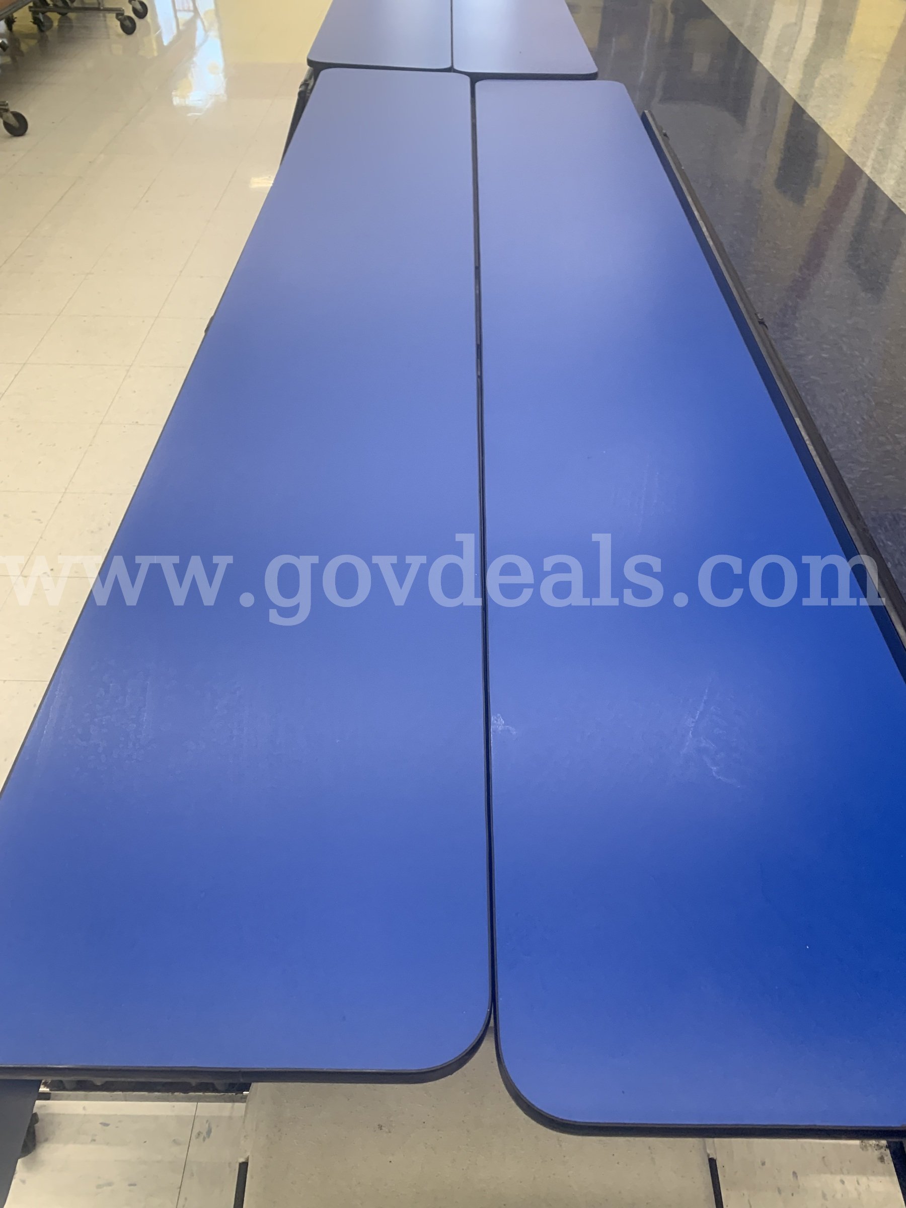 21 Lunchroom tables. (12 blue tables & 9 burgundy tables)