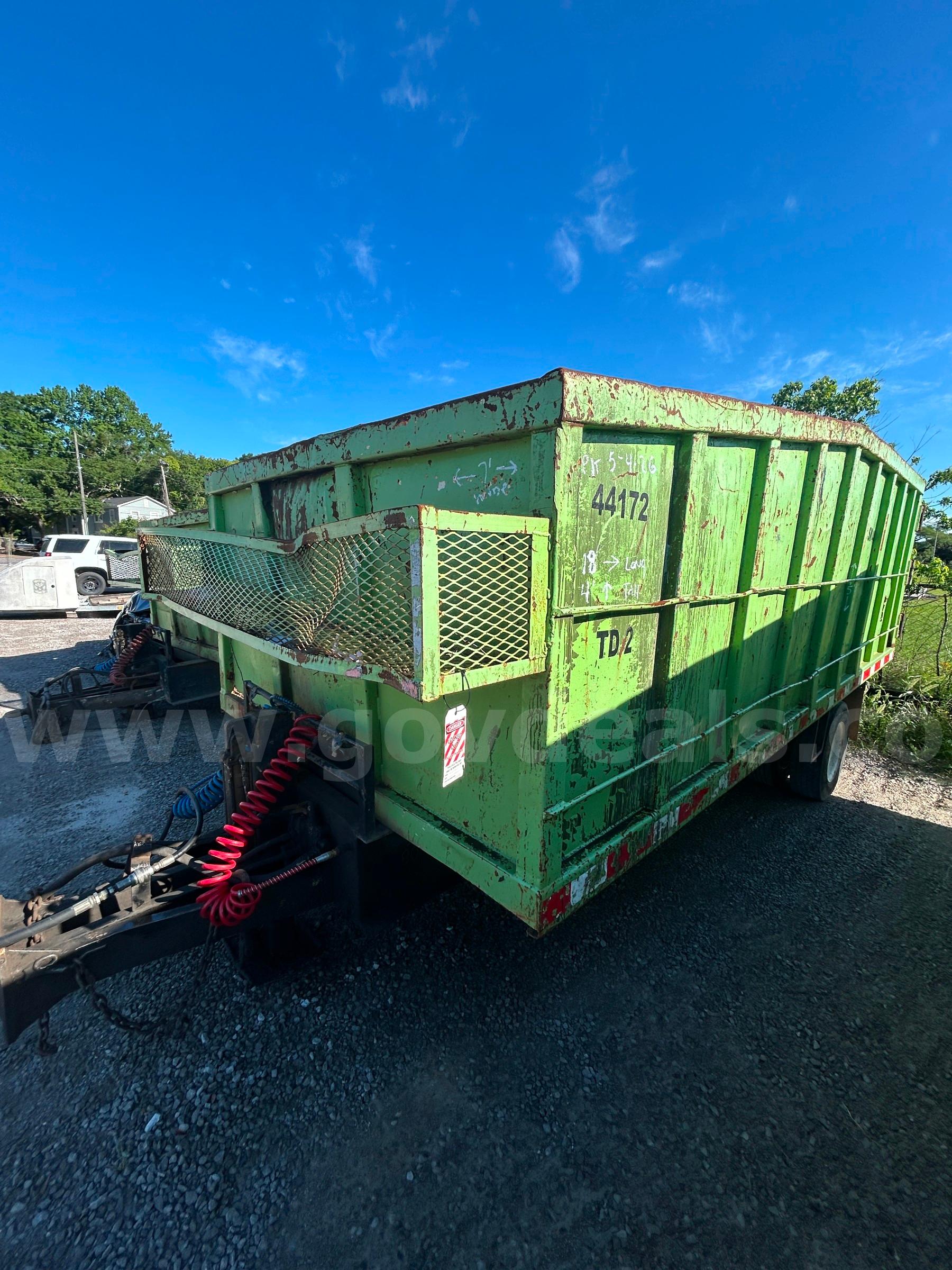 GREEN 2005 MILE 18-FT DUMPING TRASH TRAILER WITH HYDRAULIC JACK AND AIR BRAKES MILE 18-FT TRASH DUMP TRAILER Government Surplus Auction - Primary Photo