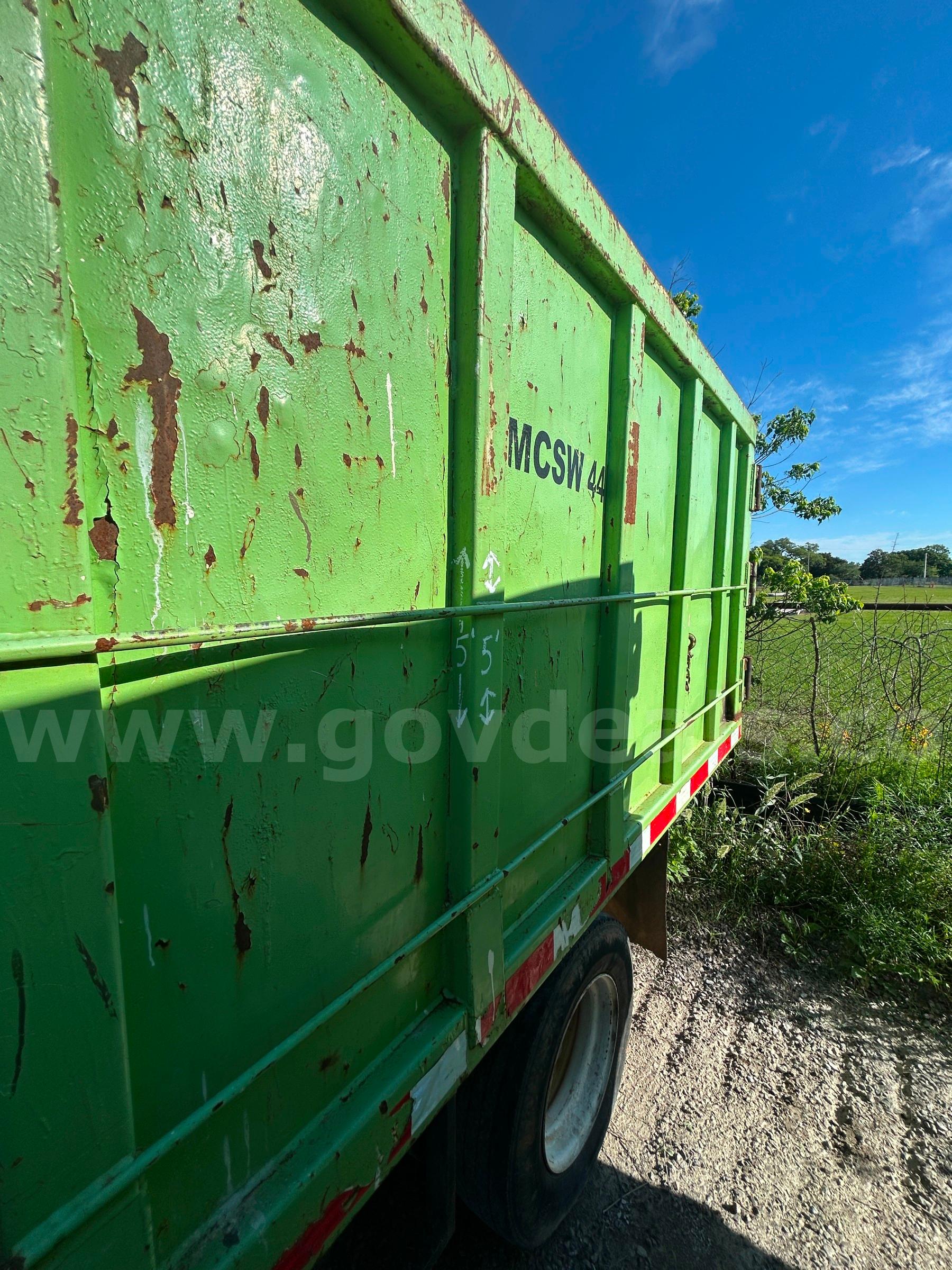 GREEN 2005 MILE 18-FT DUMPING TRASH TRAILER WITH HYDRAULIC JACK AND AIR BRAKES MILE 18-FT TRASH DUMP TRAILER Government Surplus Auction - Photo #2