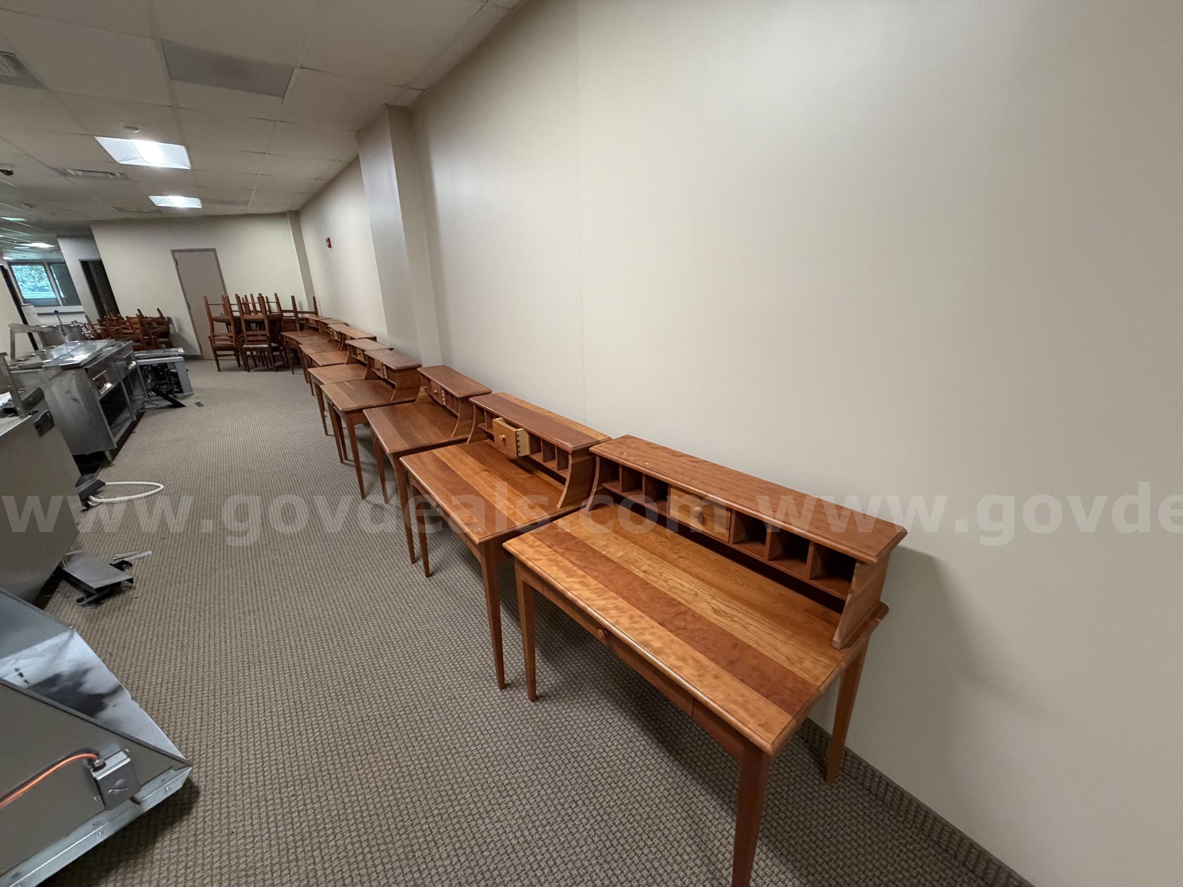 Lot of 9 writing style desks and chairs   Government Surplus Auction - Primary Photo