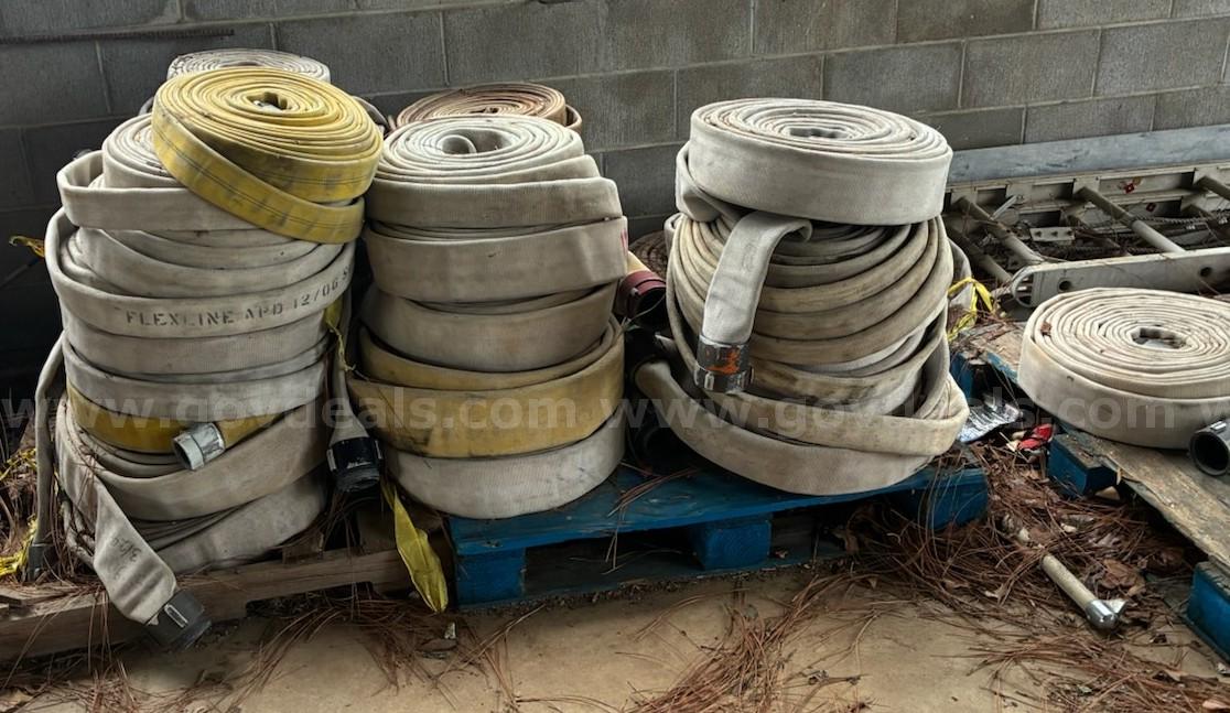 Fire Equipment - 16 Rolls of 1 3/4" hose - 21 Rolls of 1 1/2" Hose - 1 Roll of 3" Hose   Government Surplus Auction - Primary Photo