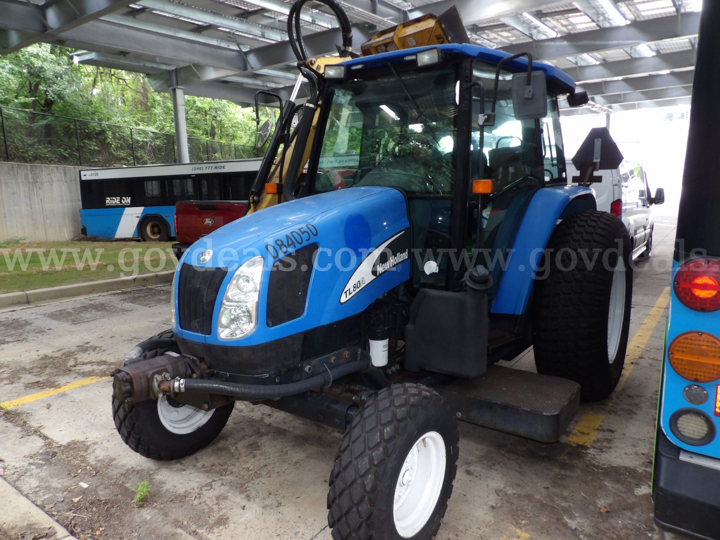 New Holland TL80A Tractor with Boom Mower