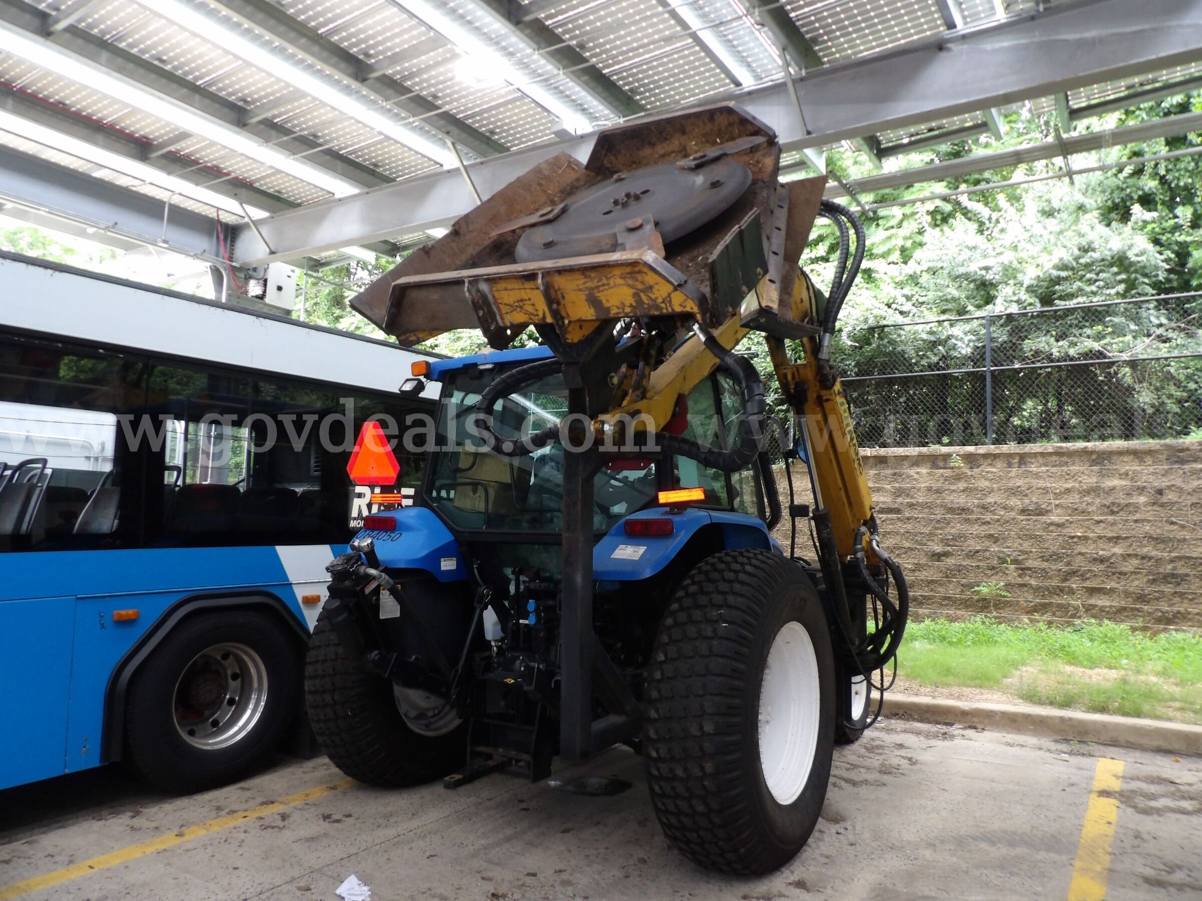 New Holland TL80A Tractor with Boom Mower New Holland  Government Surplus Auction - Photo #4