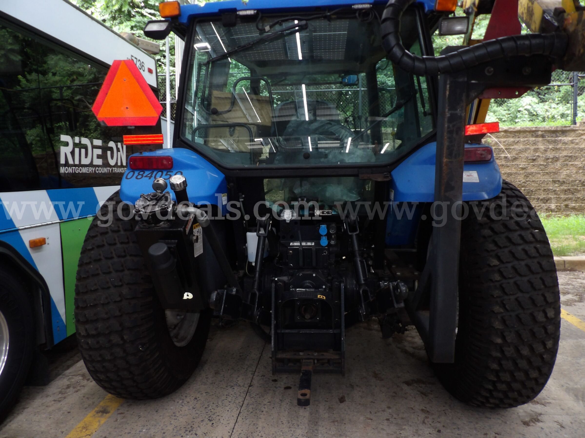 New Holland TL80A Tractor with Boom Mower New Holland  Government Surplus Auction - Photo #5
