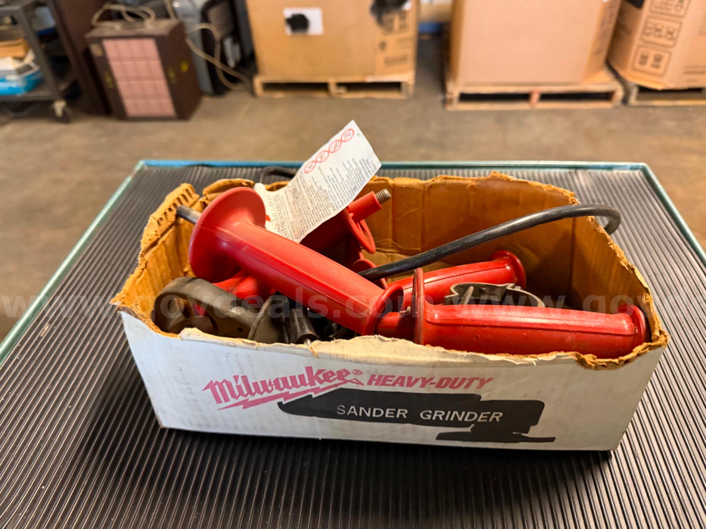 Lot of Tool Accessories & Attachments (Handles, Wrenches, Guards)   Government Surplus Auction - Primary Photo