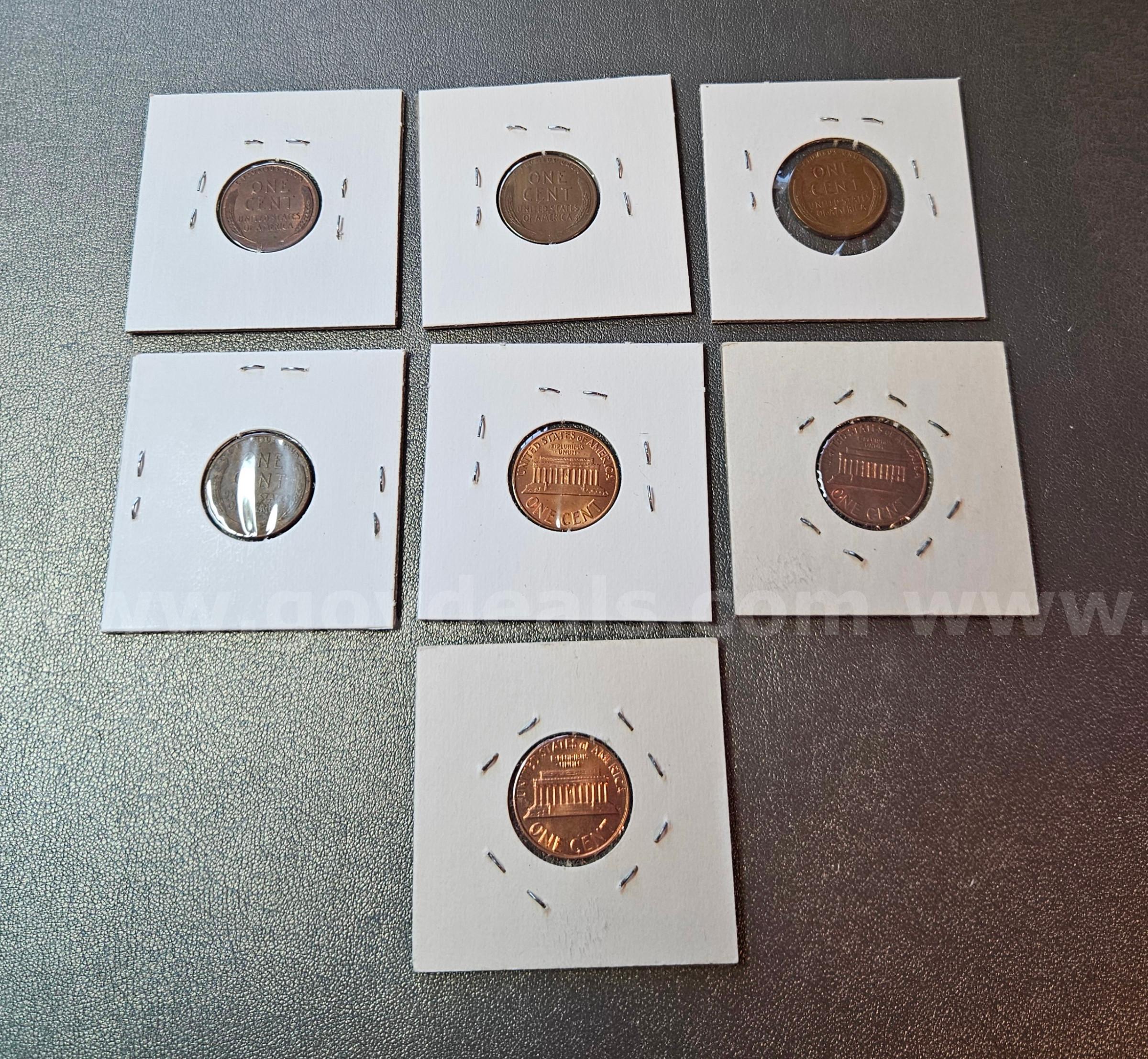 Lot of 7 Pennies in Holders   Government Surplus Auction - Photo #2