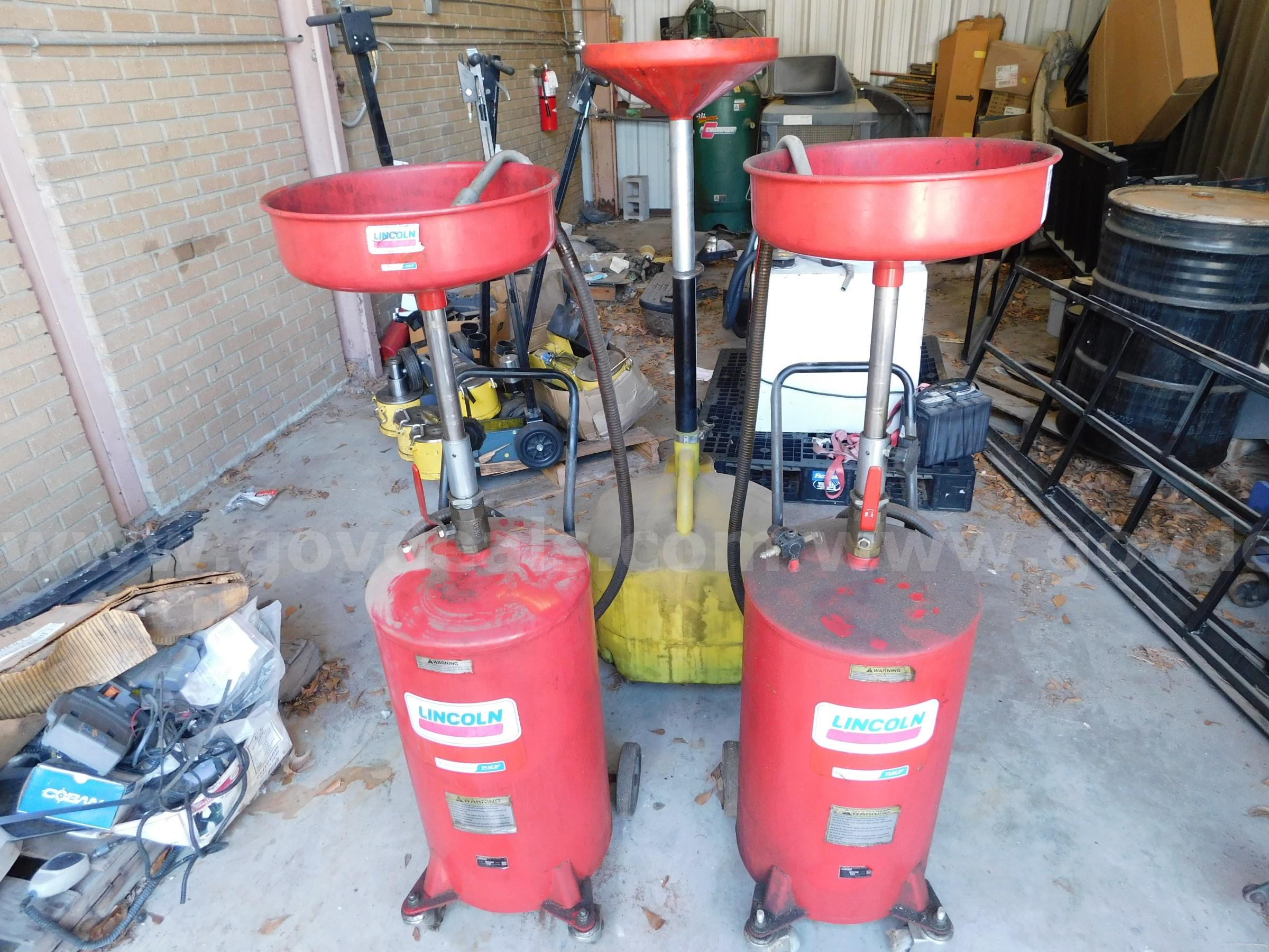 OIL DRAIN CONTAINER TANKS, 3 , TWO LINCOLN, 18 GAL, - ONE UNKNOWN LINCOLN 3601 Government Surplus Auction - Primary Photo