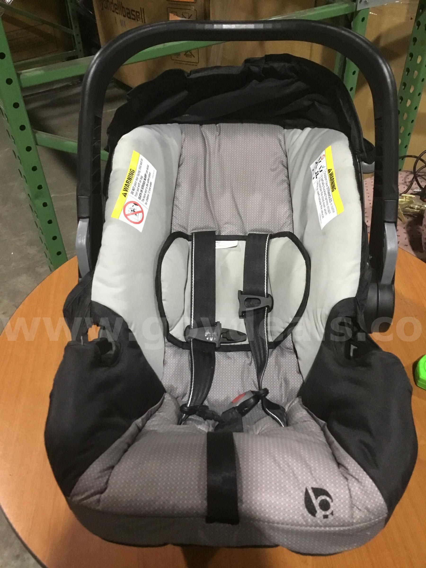 Gray & black baby car seat  "DH"   Government Surplus Auction - Primary Photo