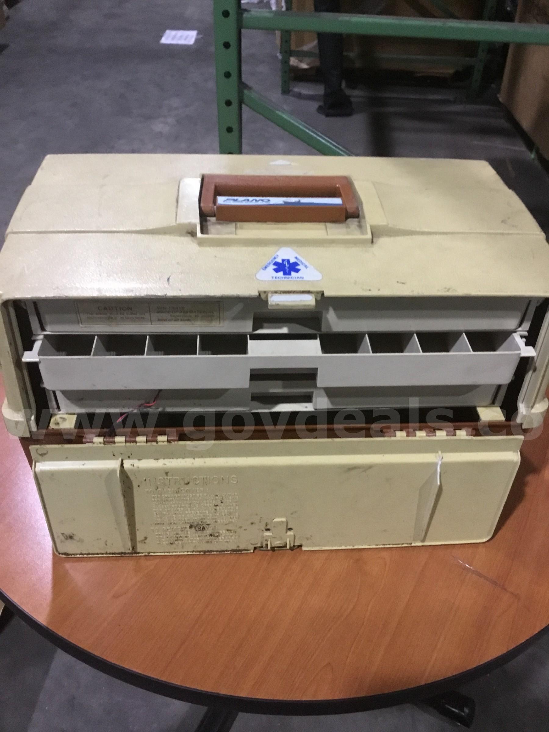 Beige & dark brown medical tool box  "DH"   Government Surplus Auction - Primary Photo
