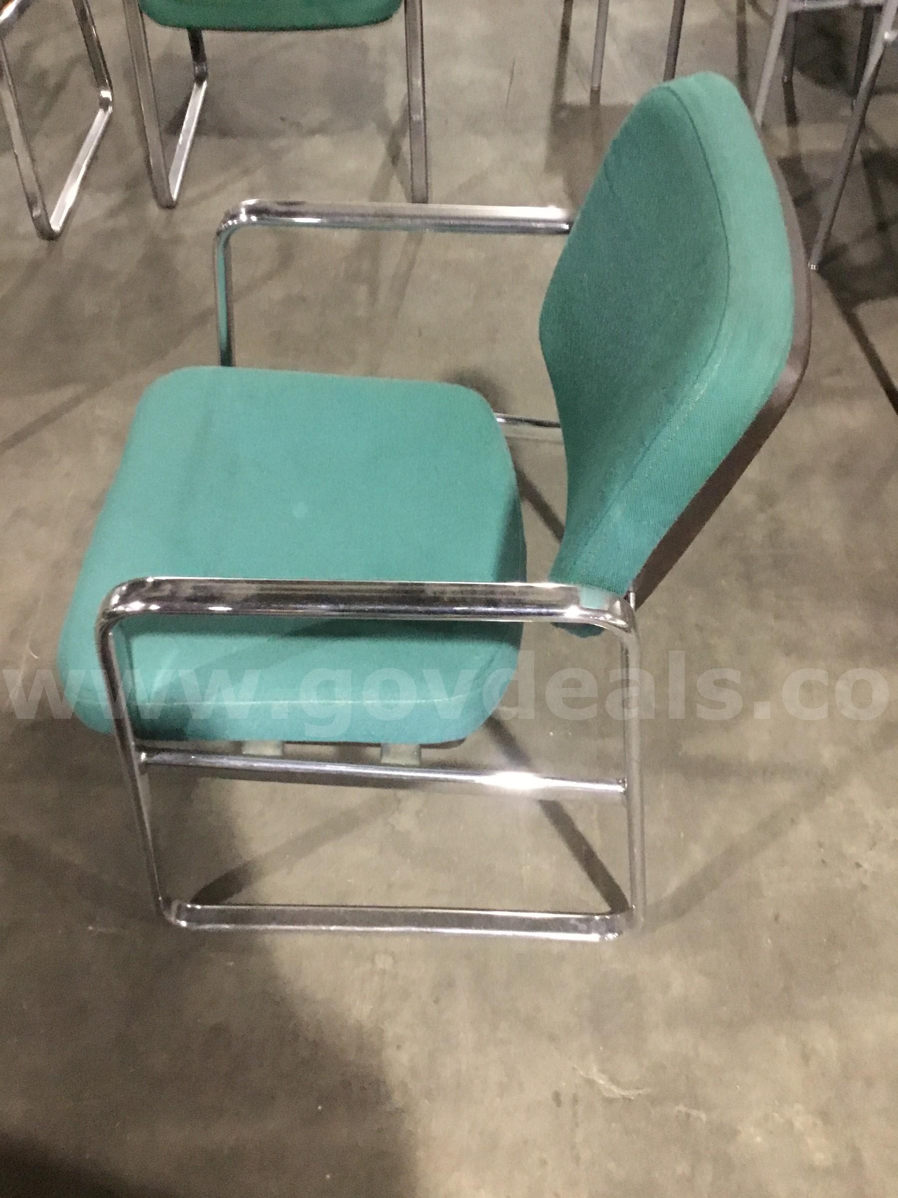 4 green sled chairs; with chrome silver armrests  "DH"   Government Surplus Auction - Photo #2