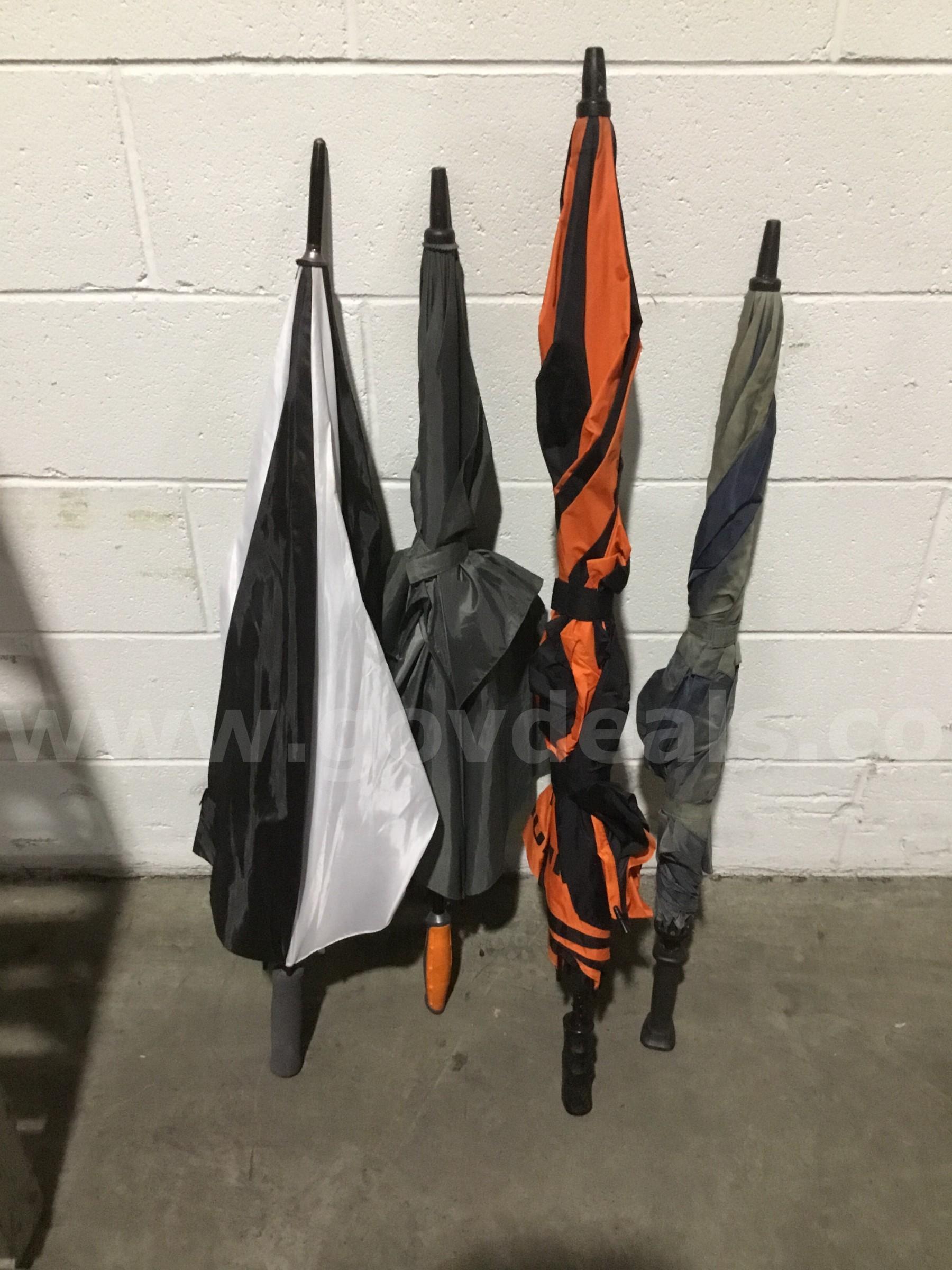 4 misc umbrellas-orange & black striped umbrella  "DH"