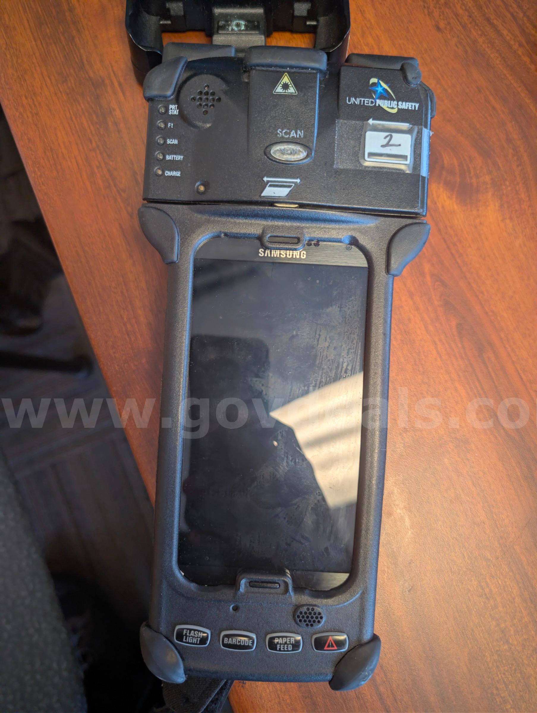 (2) United Public Safety hand held N5 Scan device with charging docks   Government Surplus Auction - Photo #2