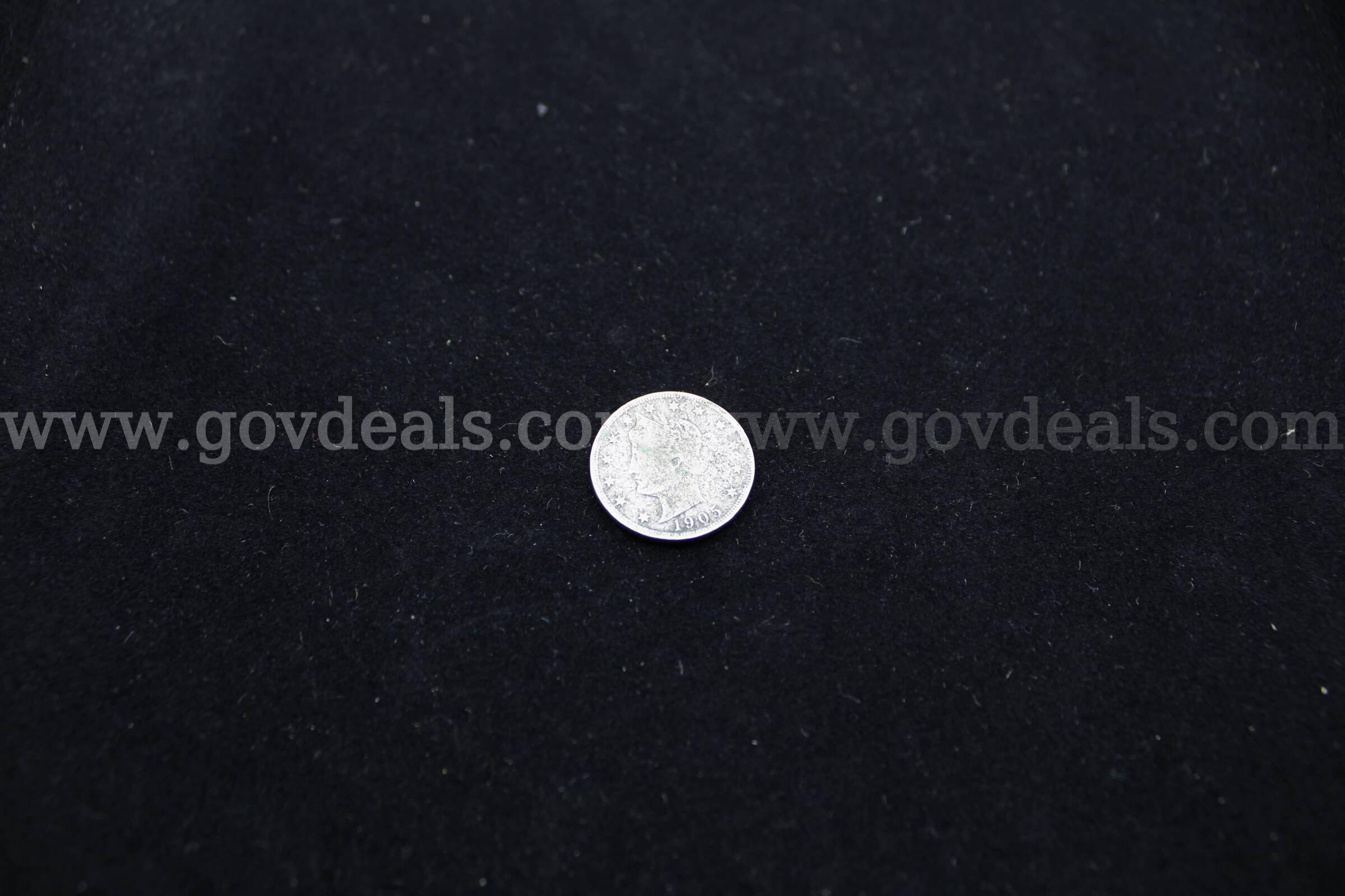 MONEY VICTORY NICKEL   Government Surplus Auction - Primary Photo