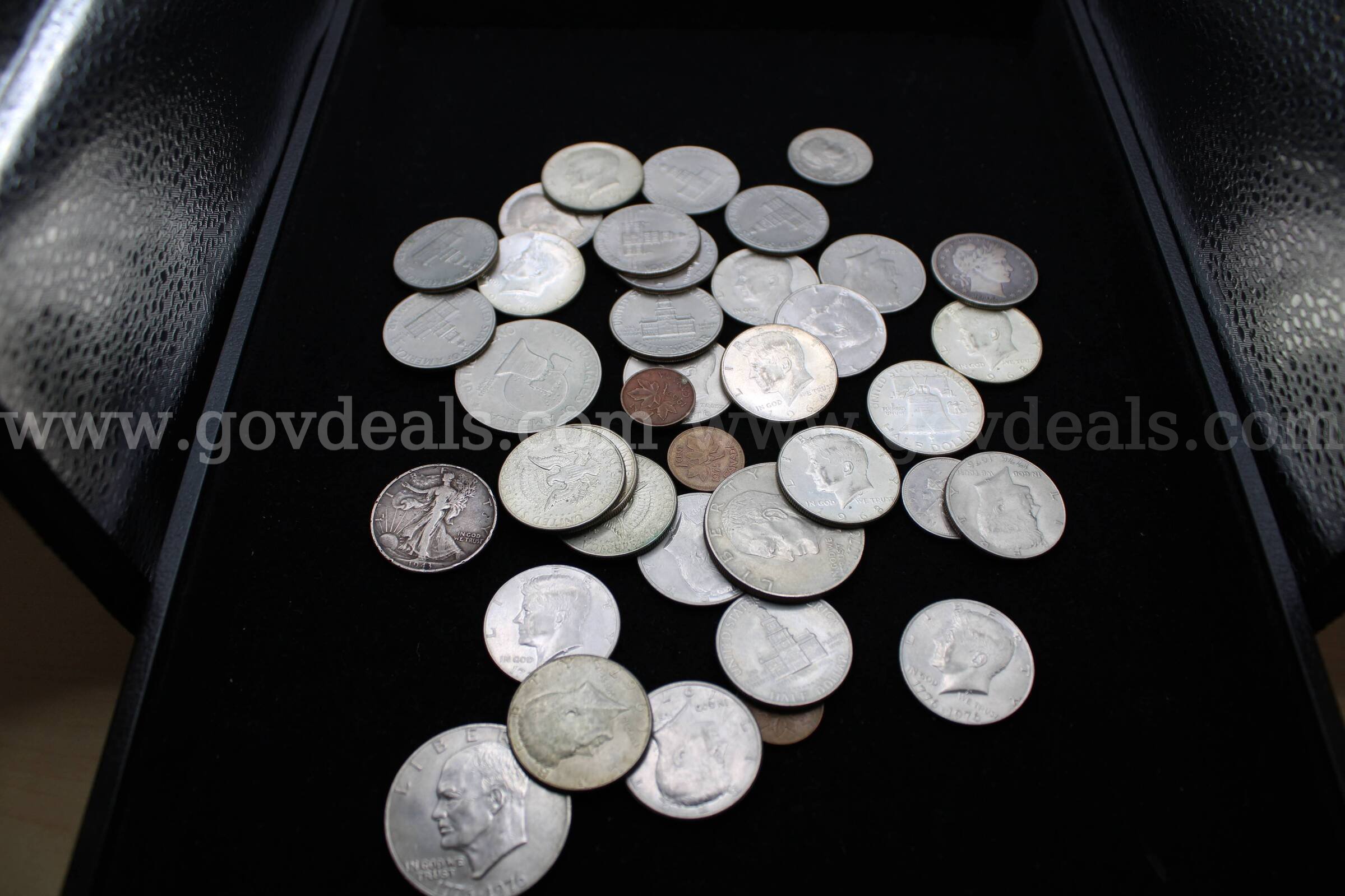 Dollar Coins (4)    Half Dollars (30)     Foreign Coins (4)   Government Surplus Auction - Primary Photo