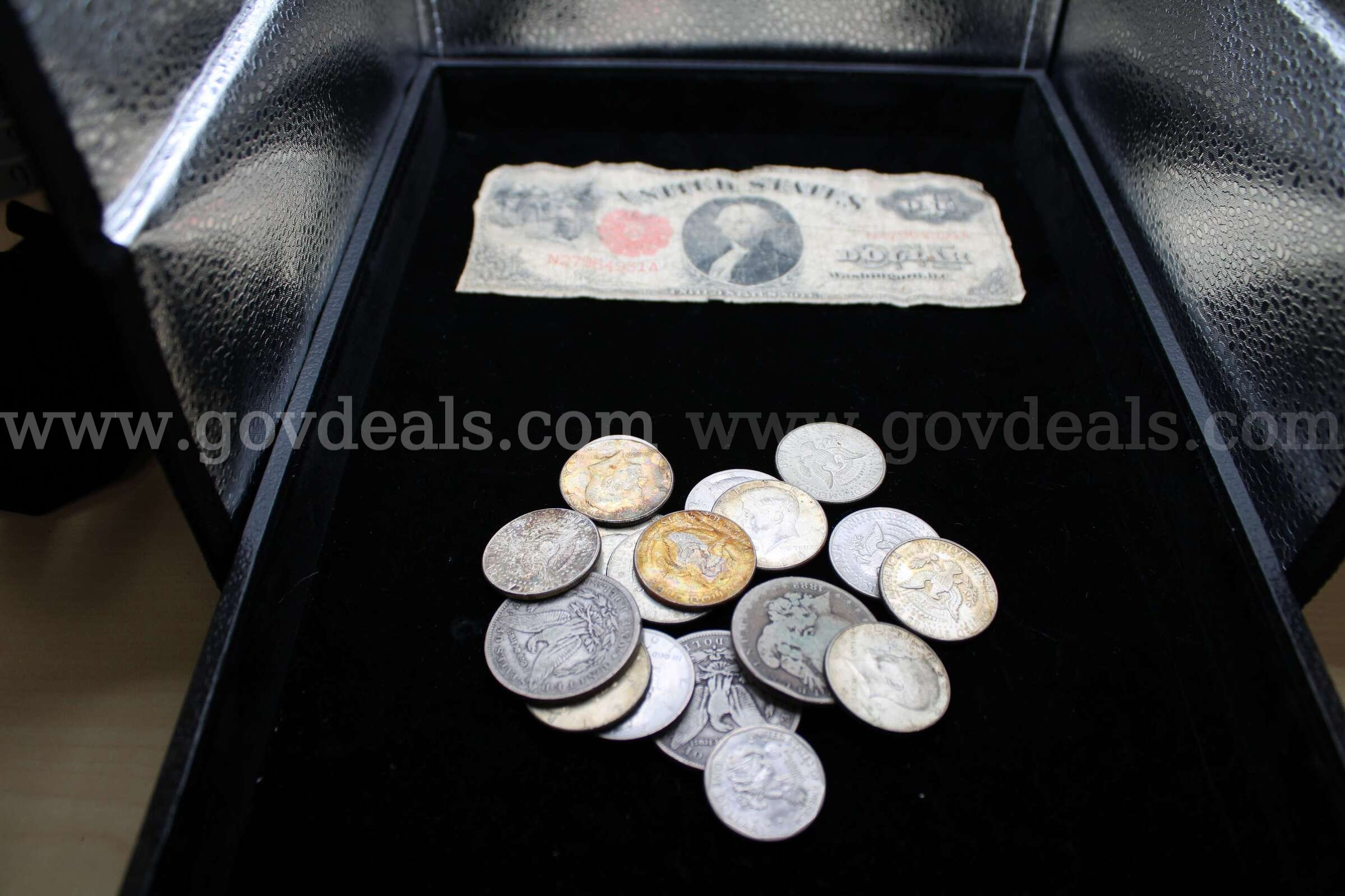 $1 Bill (1)   $1 Coin (5)  Half Dollar Coin (13)   half penny (1)   Government Surplus Auction - Primary Photo