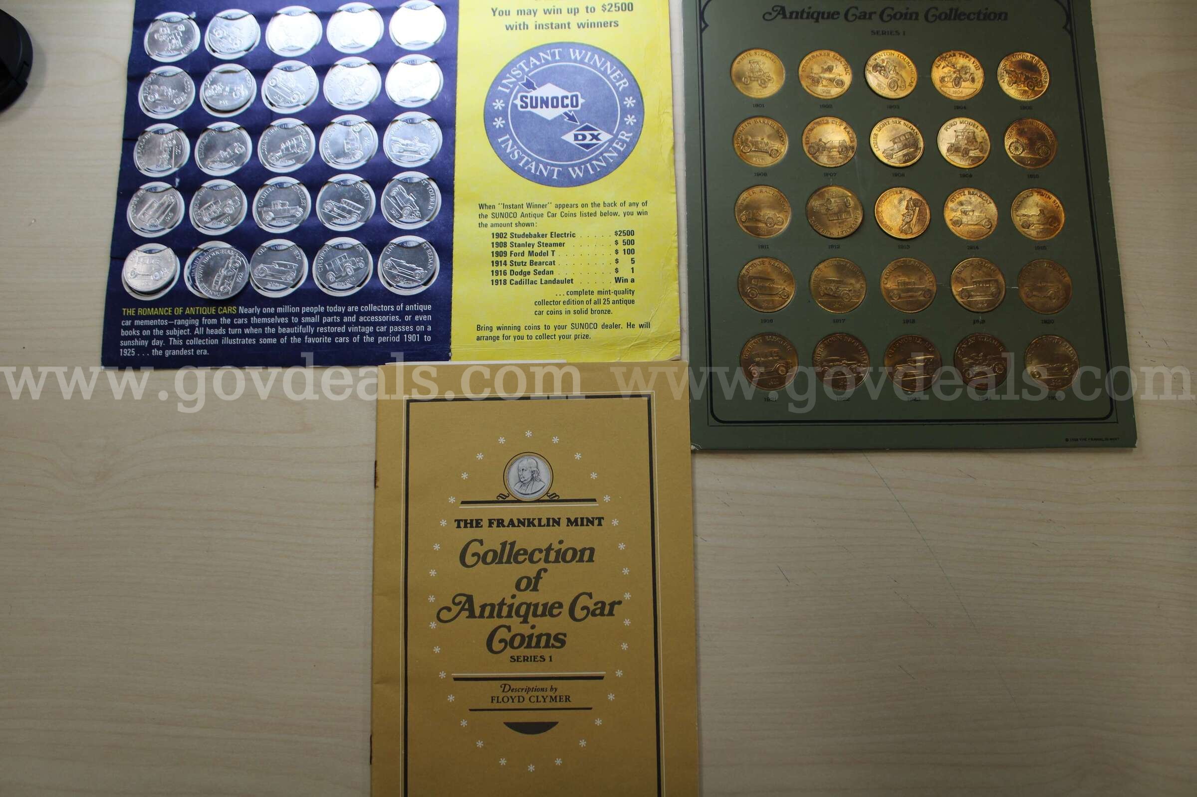 COIN SETS (2); BOOKLET (1)   Government Surplus Auction - Primary Photo