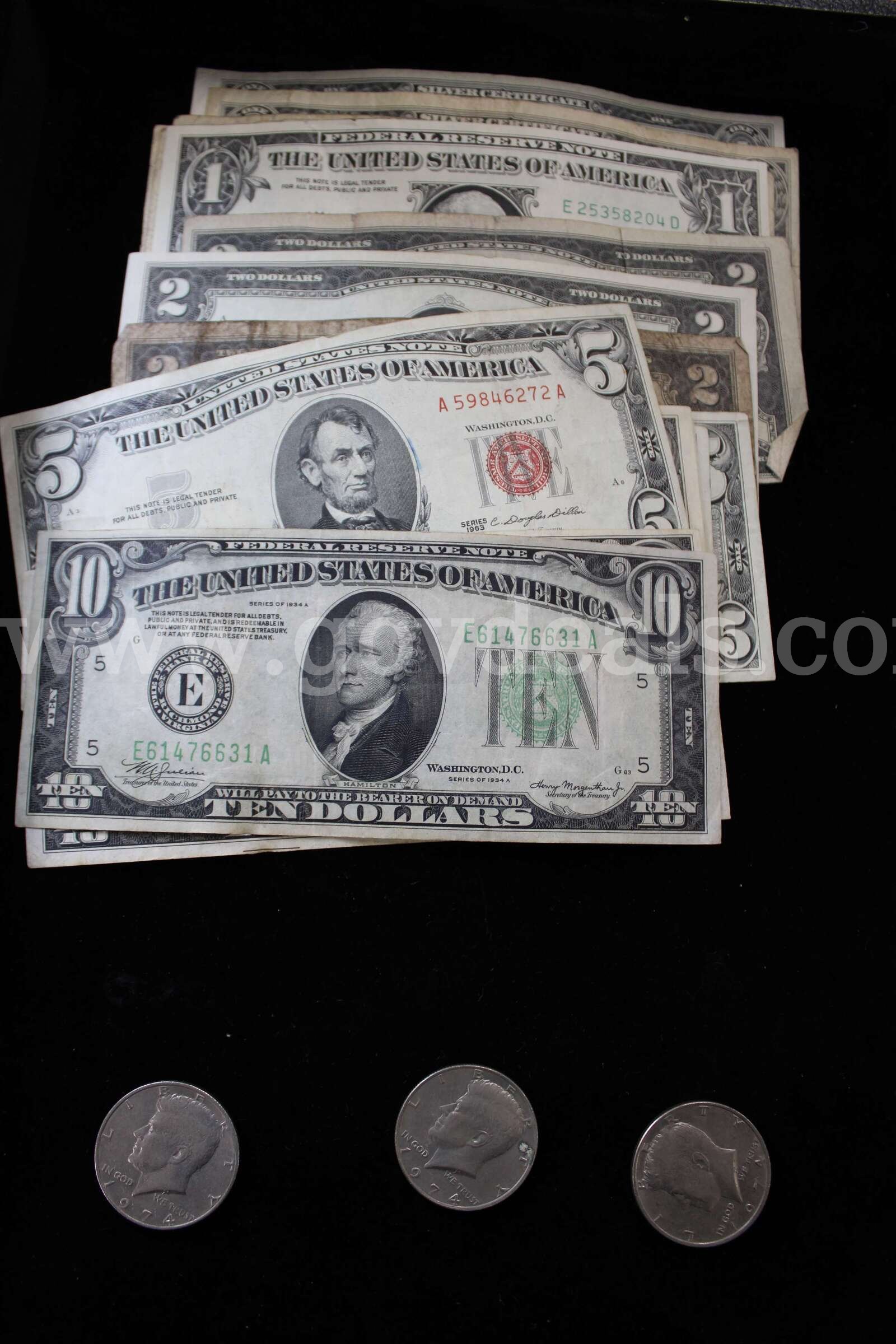 $10 (2); $5 (7); $2 (3); $1 (7); HALF DOLLAR (3)   Government Surplus Auction - Primary Photo