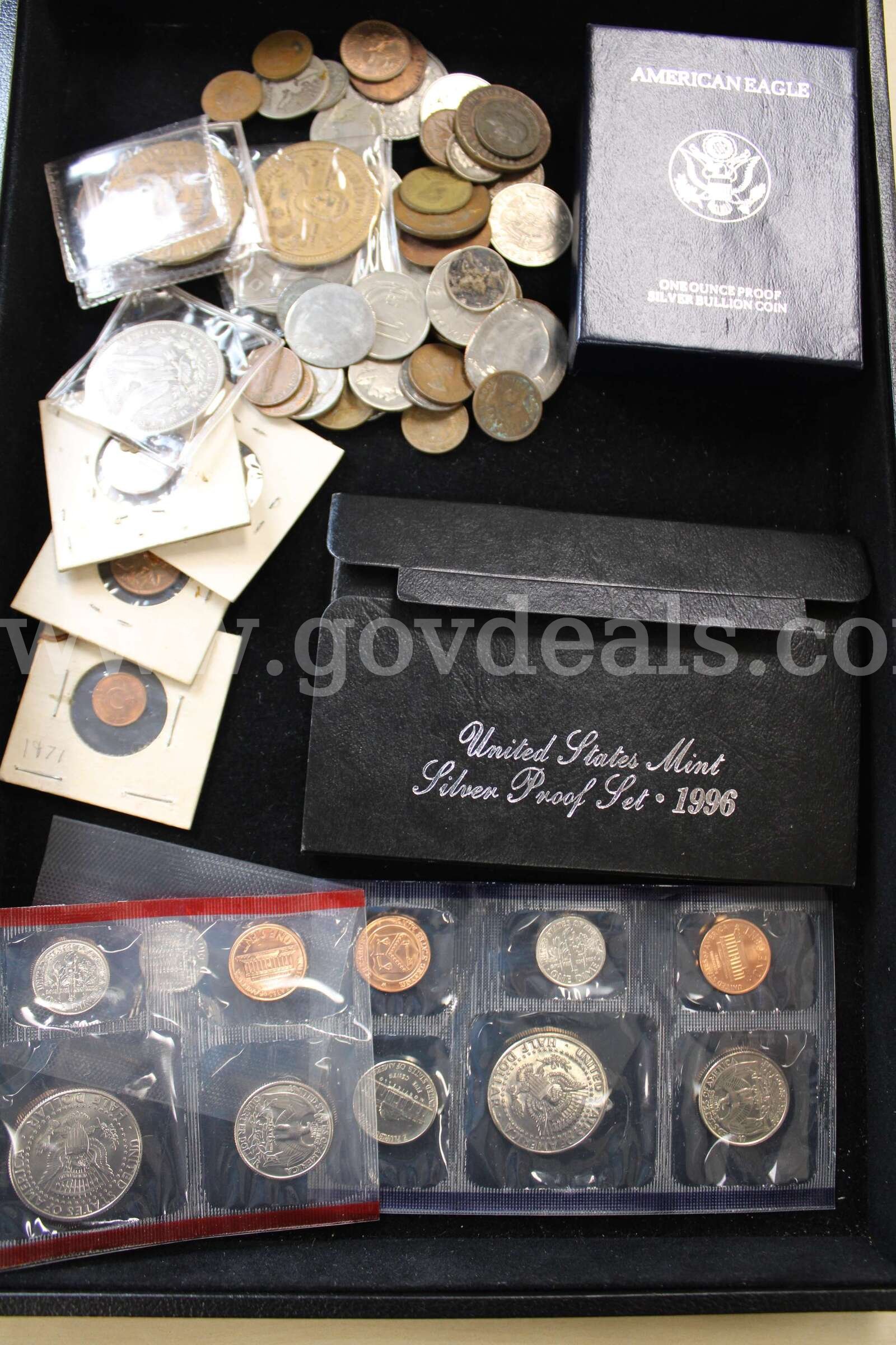 $1 COIN (2); COIN SET (3); NICKEL (3); PENNY (4); DIME (3); FOREIGN, COINS (27)   Government Surplus Auction - Primary Photo
