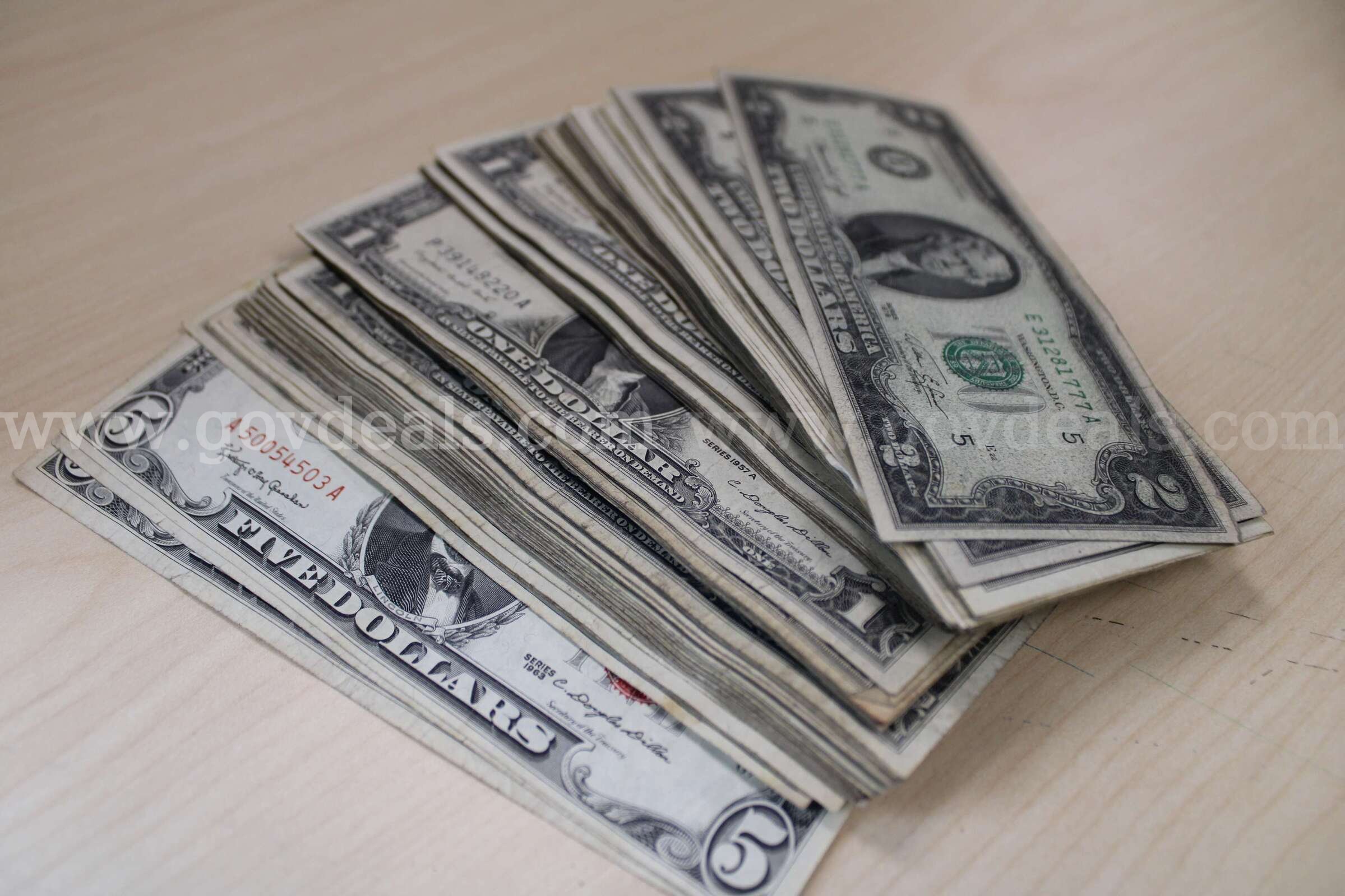 $5.00 (14)     $2.00 (15)     $1.00 (77)   Government Surplus Auction - Primary Photo
