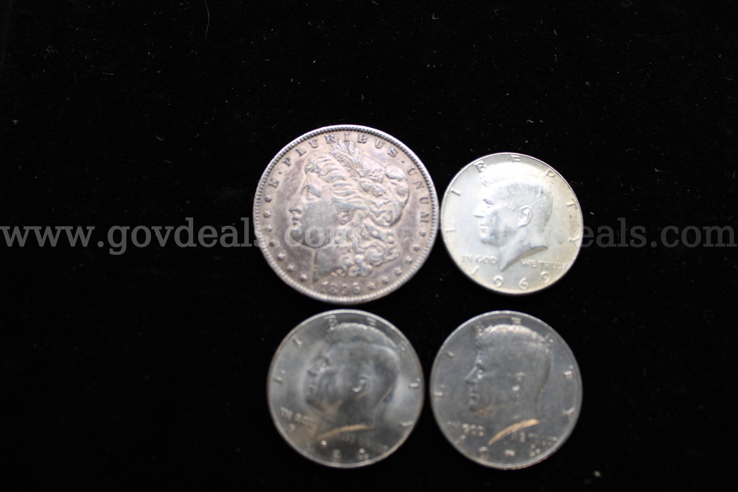 $1 COIN (1); HALF DOLLAR (3)   Government Surplus Auction - Primary Photo