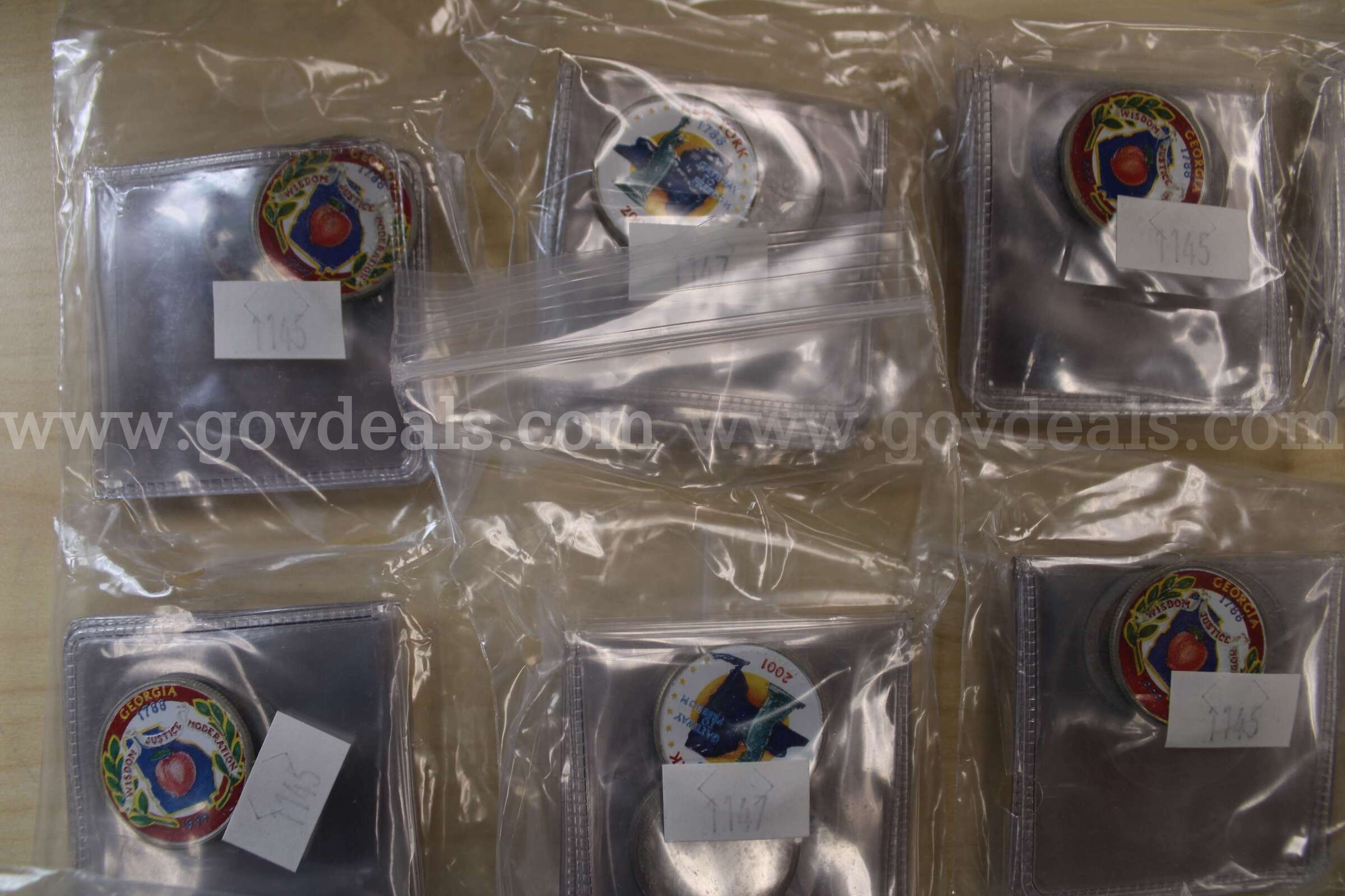 NICKELS ROLLED (12); QUARTERS IN SLEEVES   Government Surplus Auction - Photo #6