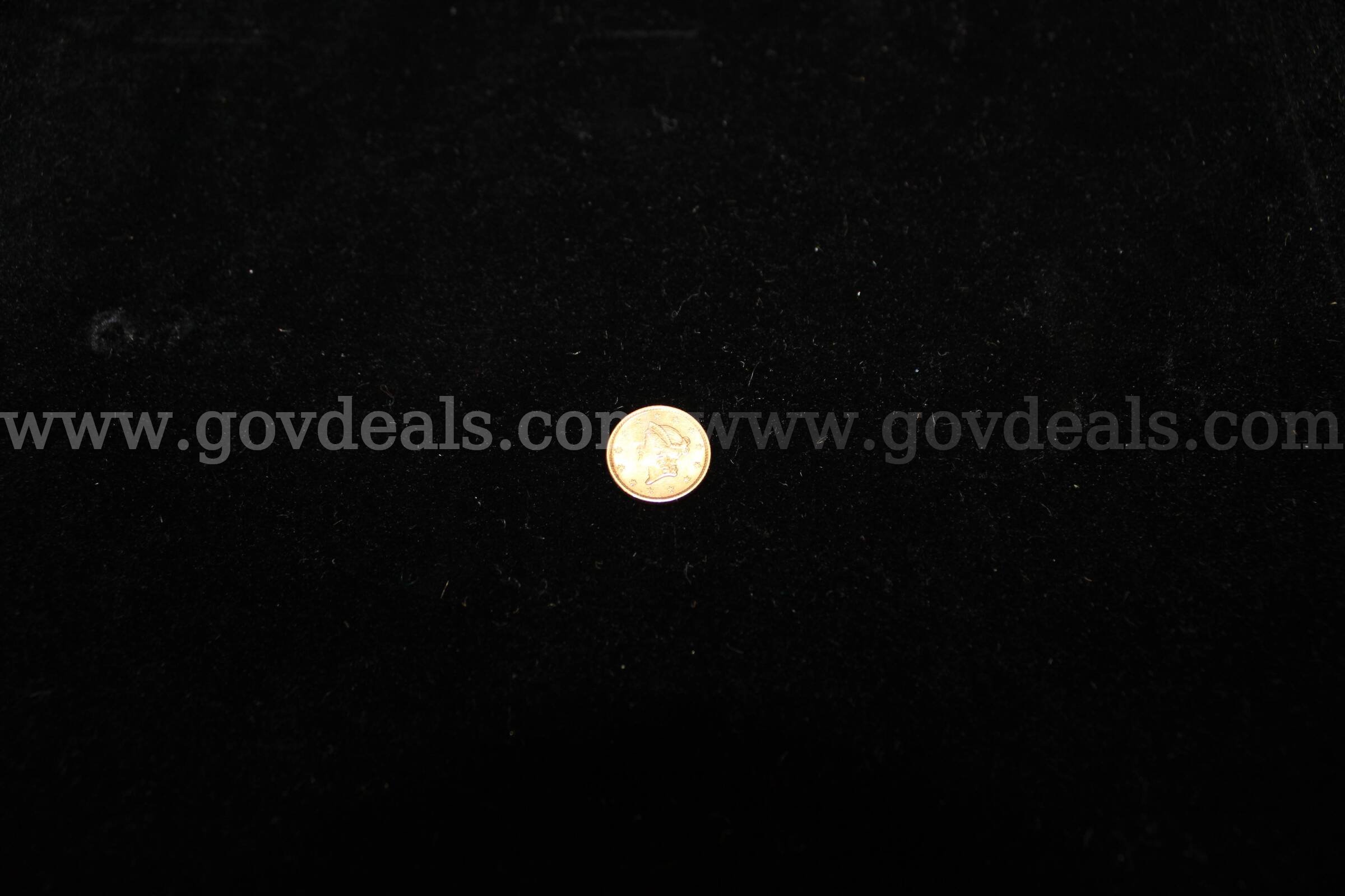 $1 COIN (1)   Government Surplus Auction - Primary Photo