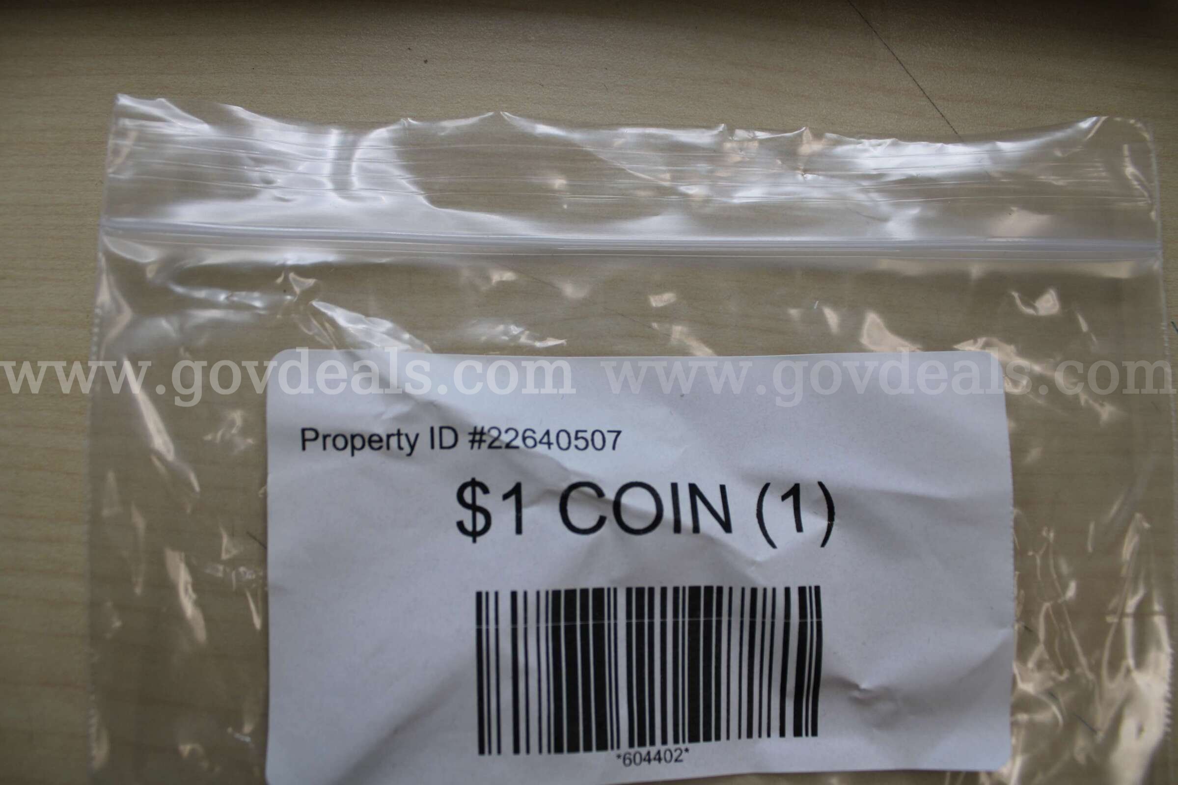 $1 COIN (1)   Government Surplus Auction - Photo #3