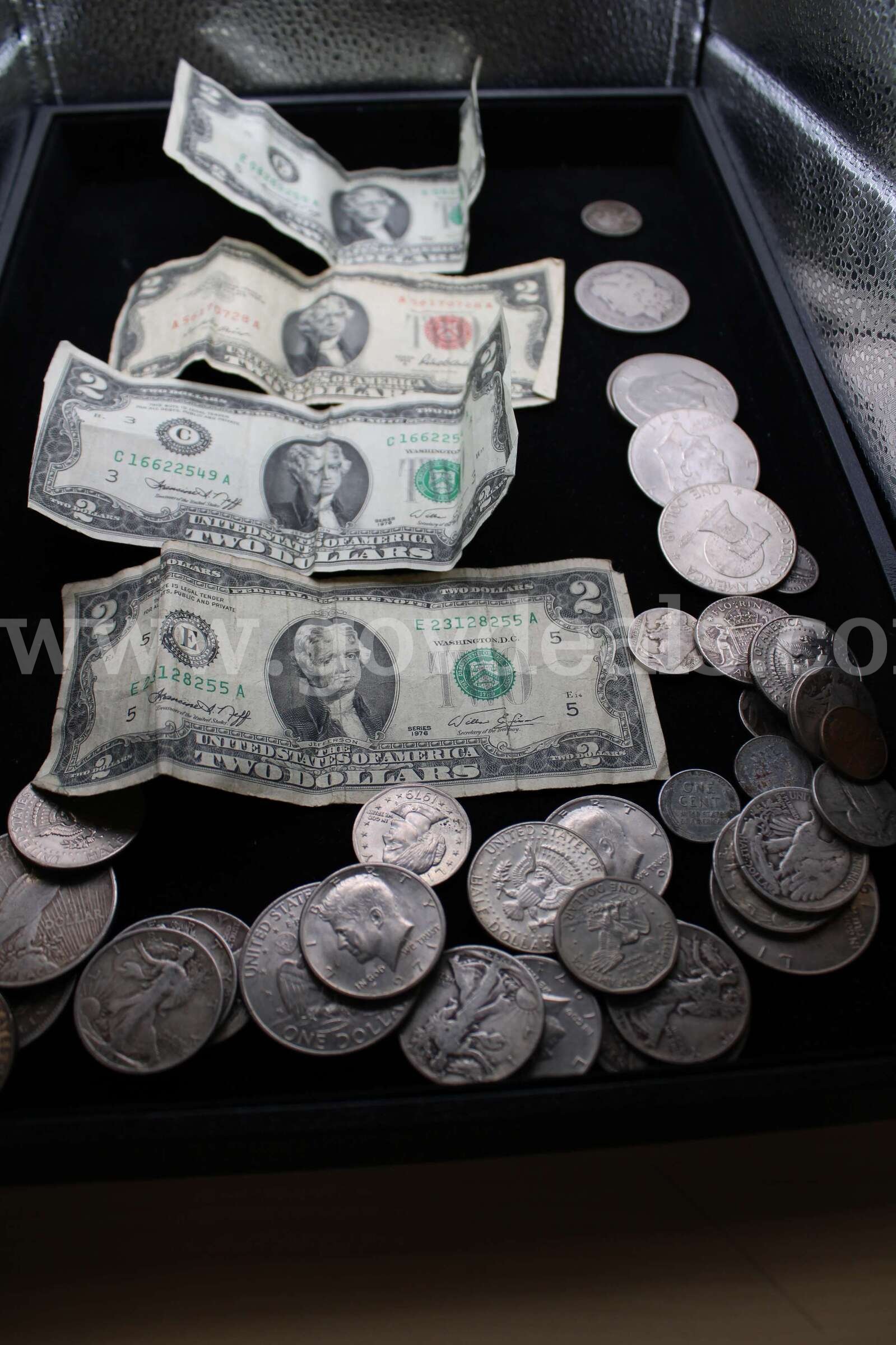 $2 BILL (4); $1 COIN (13); HALF DOLLAR (14); QUARTER (3); DIME (2); NICKEL (4)   Government Surplus Auction - Primary Photo