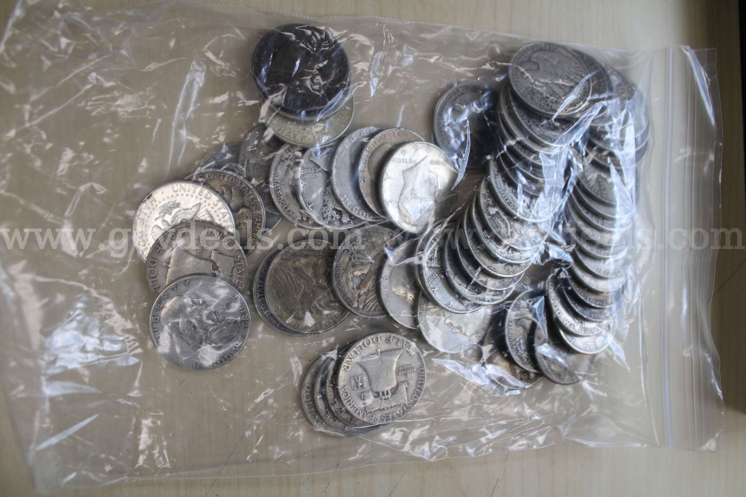 COLLECTABLE COINS (2); DIME, ROLLED (2); $1 COIN (16); HALF DOLLAR (100)  100 Government Surplus Auction - Photo #2