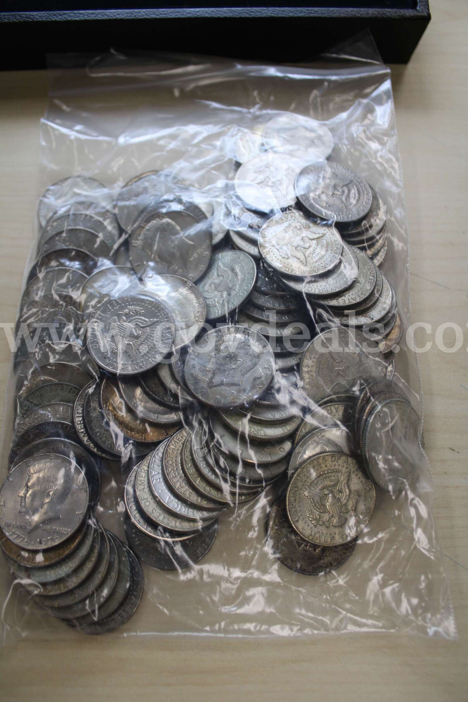 COLLECTABLE COINS (2); DIME, ROLLED (2); $1 COIN (16); HALF DOLLAR (100)  100 Government Surplus Auction - Photo #5