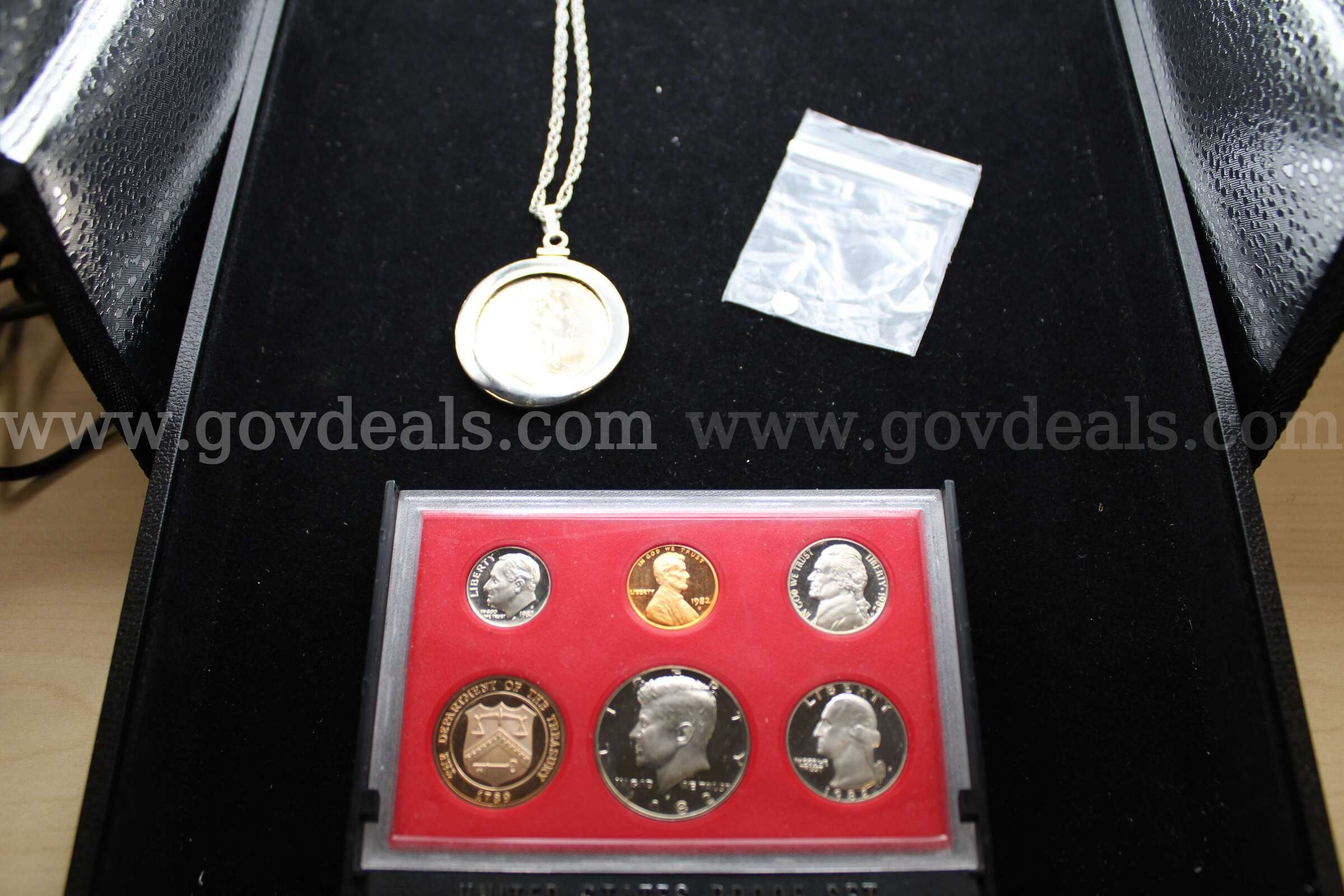 PROOF SET (1); NECKLACE WITH COIN (1); MISC COIN (1)   Government Surplus Auction - Primary Photo