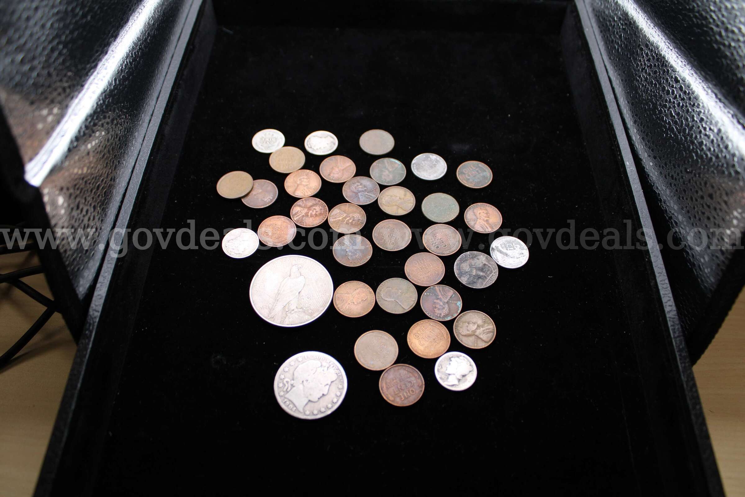 PENNY (28); $1 COIN (1); HALF DOLLAR (1); DIME (4); NICKEL (1)   Government Surplus Auction - Primary Photo