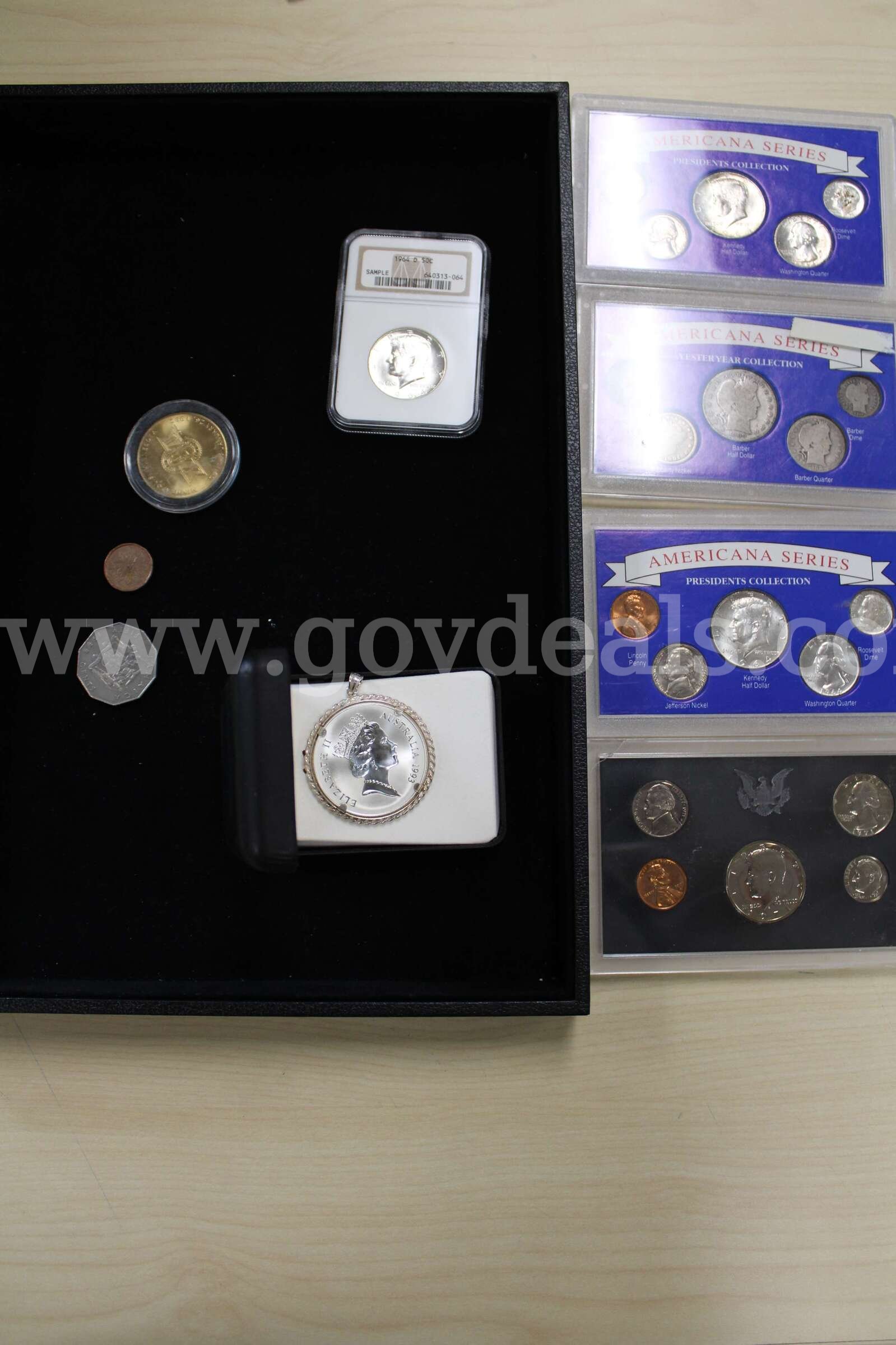 COIN SETS (4); HALF DOLLAR (1); FOREIGN COIN (3); NICKEL (1); TOKEN (1)   Government Surplus Auction - Primary Photo