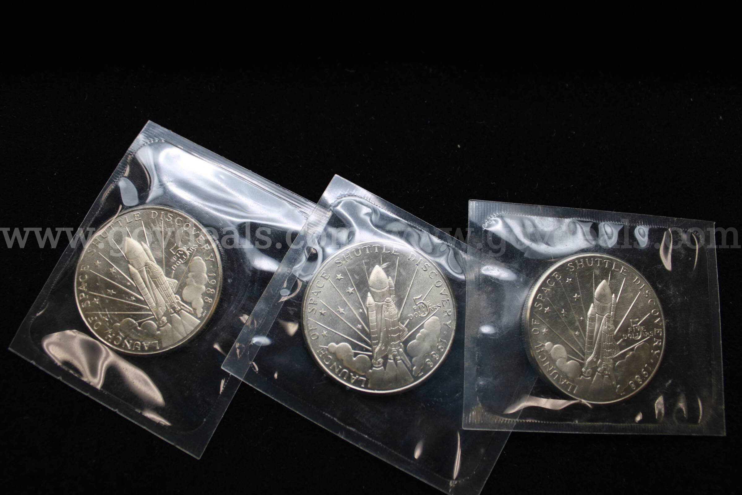 SPACE SHUTTLE COINS (3)   Government Surplus Auction - Primary Photo