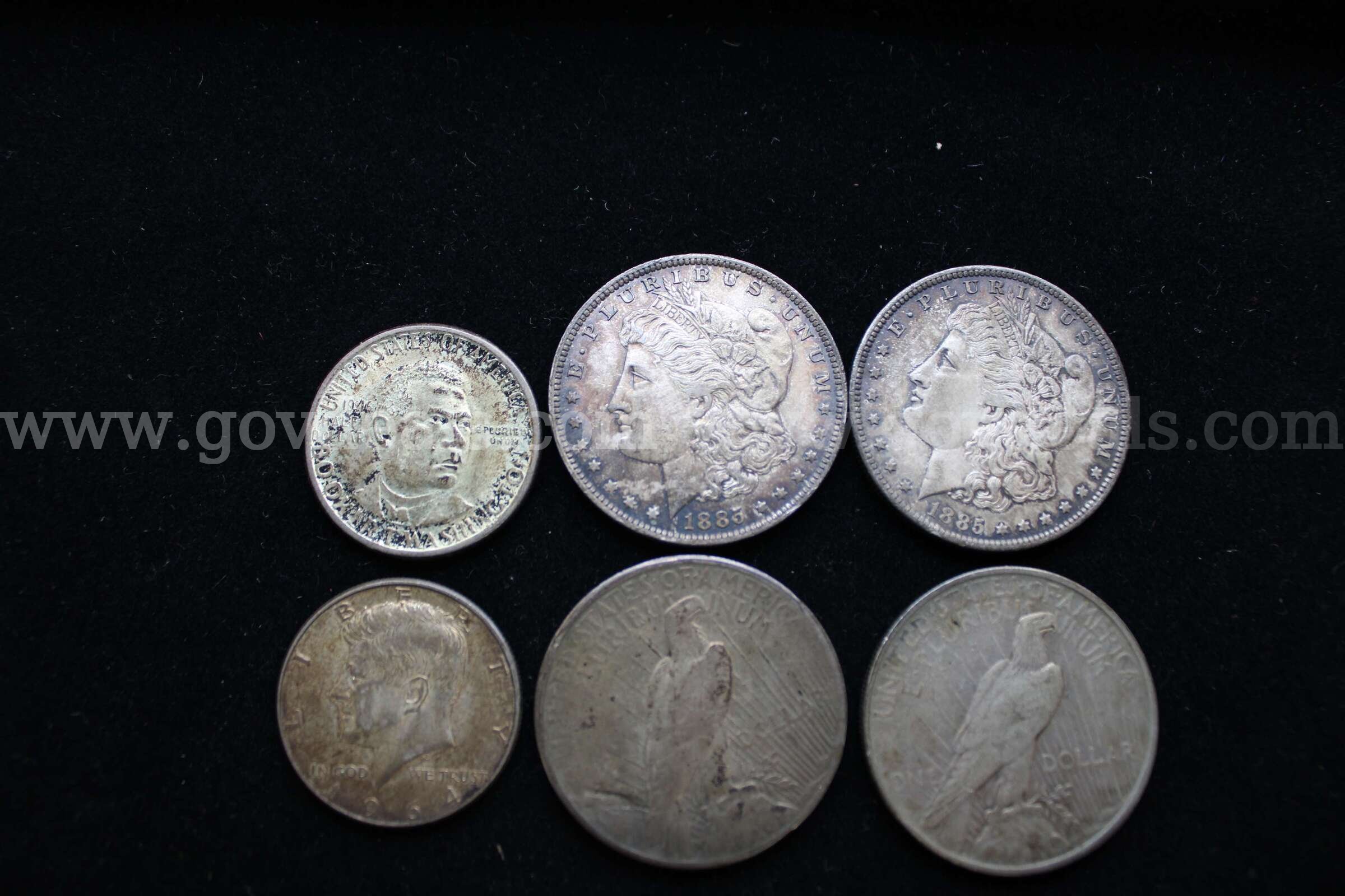 $1 COIN (4); HALF $ (2)   Government Surplus Auction - Primary Photo