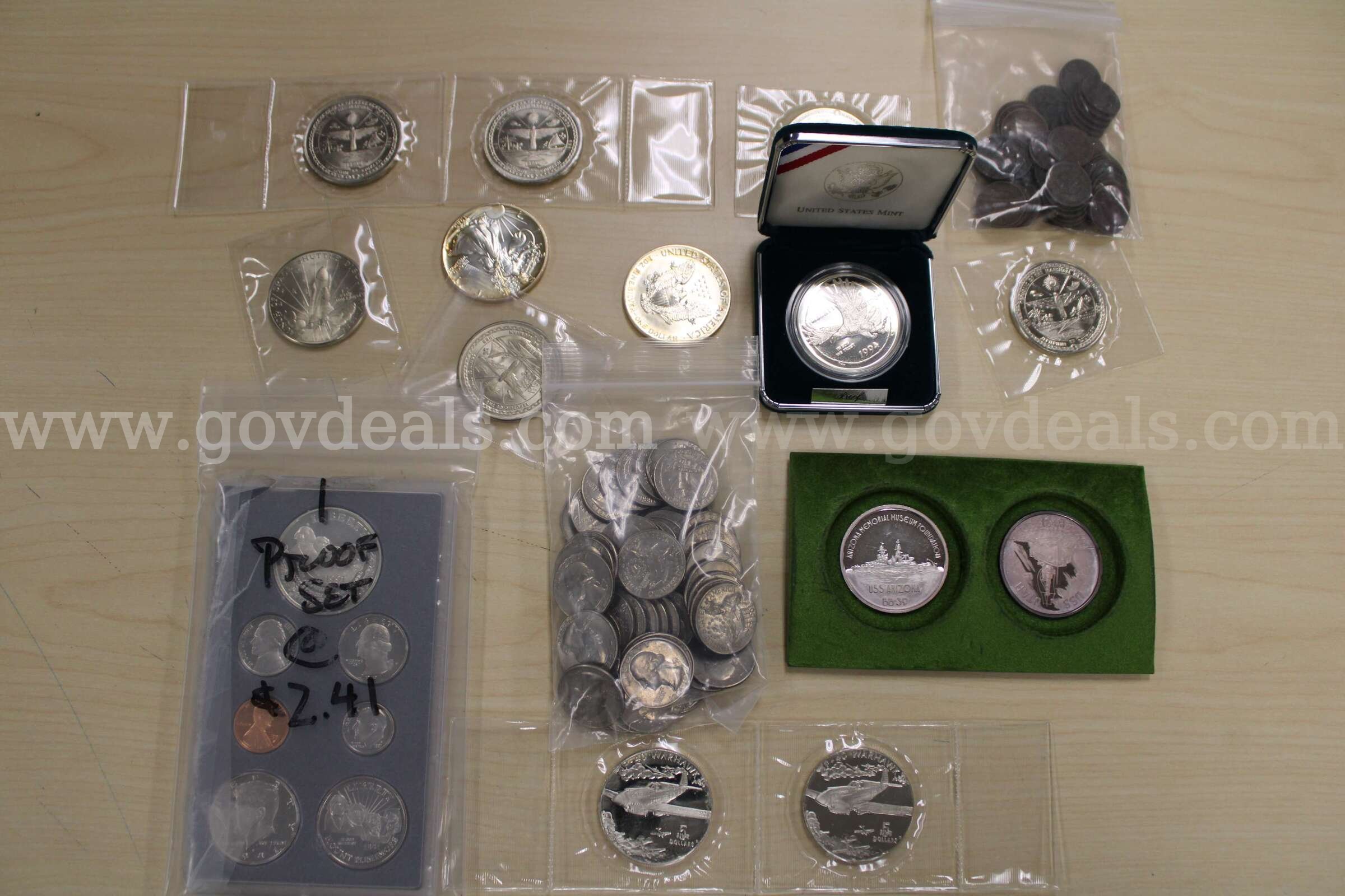 PROOF SET (1); COLLECTORS COINS (10); $1 COIN (3); QUARTER (56); PENNY (56)   Government Surplus Auction - Primary Photo