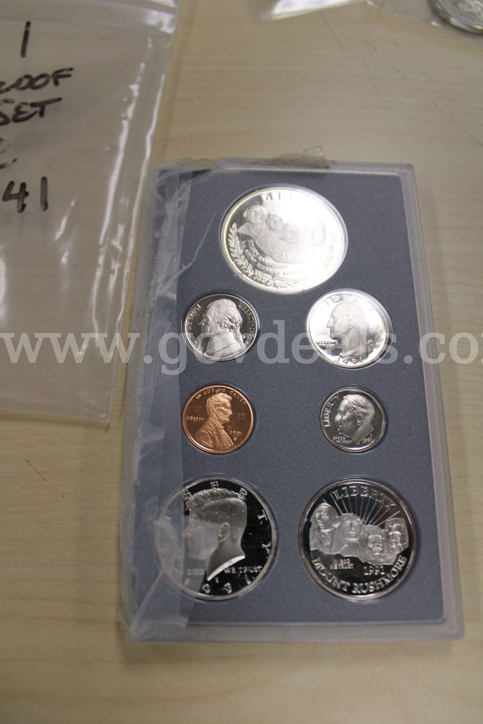 PROOF SET (1); COLLECTORS COINS (10); $1 COIN (3); QUARTER (56); PENNY (56)   Government Surplus Auction - Photo #4