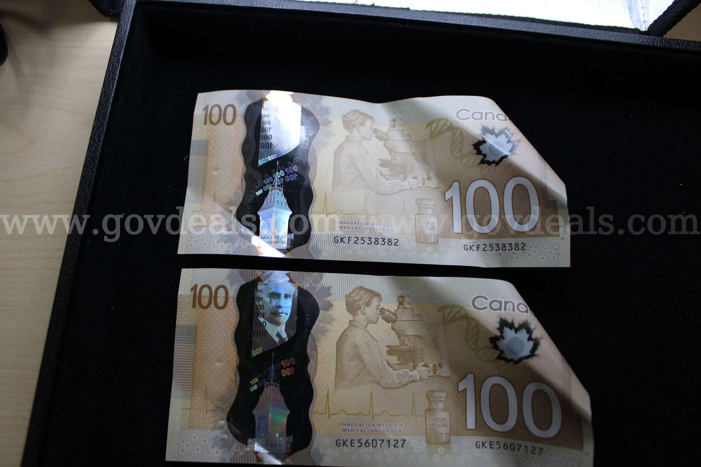 FOREIGN BILLS (2)   Government Surplus Auction - Primary Photo
