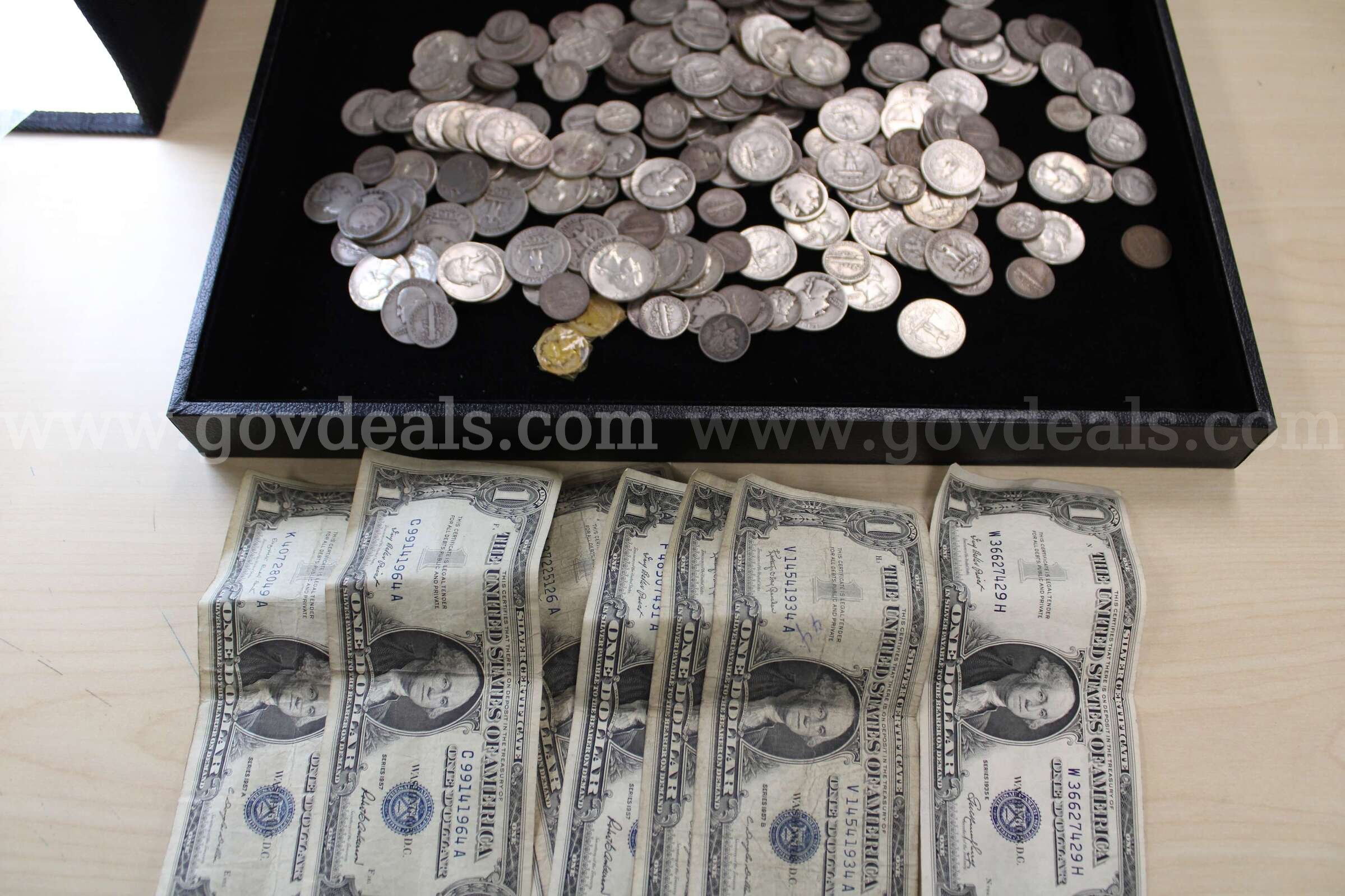 Nickels (5); Pennies (5); Silver Dollar (1); Dimes (99); Quarters (97)   Government Surplus Auction - Primary Photo