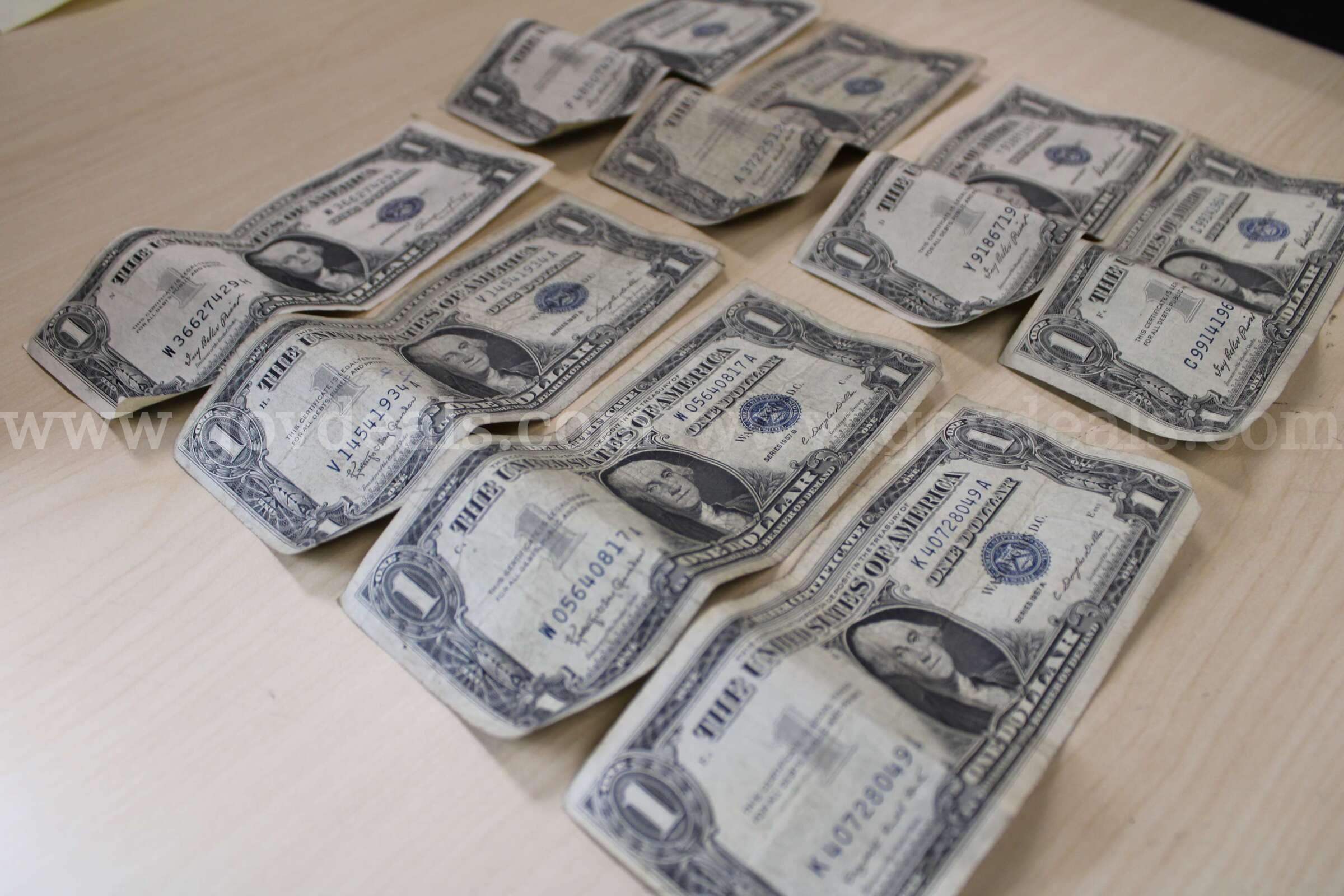 Nickels (5); Pennies (5); Silver Dollar (1); Dimes (99); Quarters (97)   Government Surplus Auction - Photo #3
