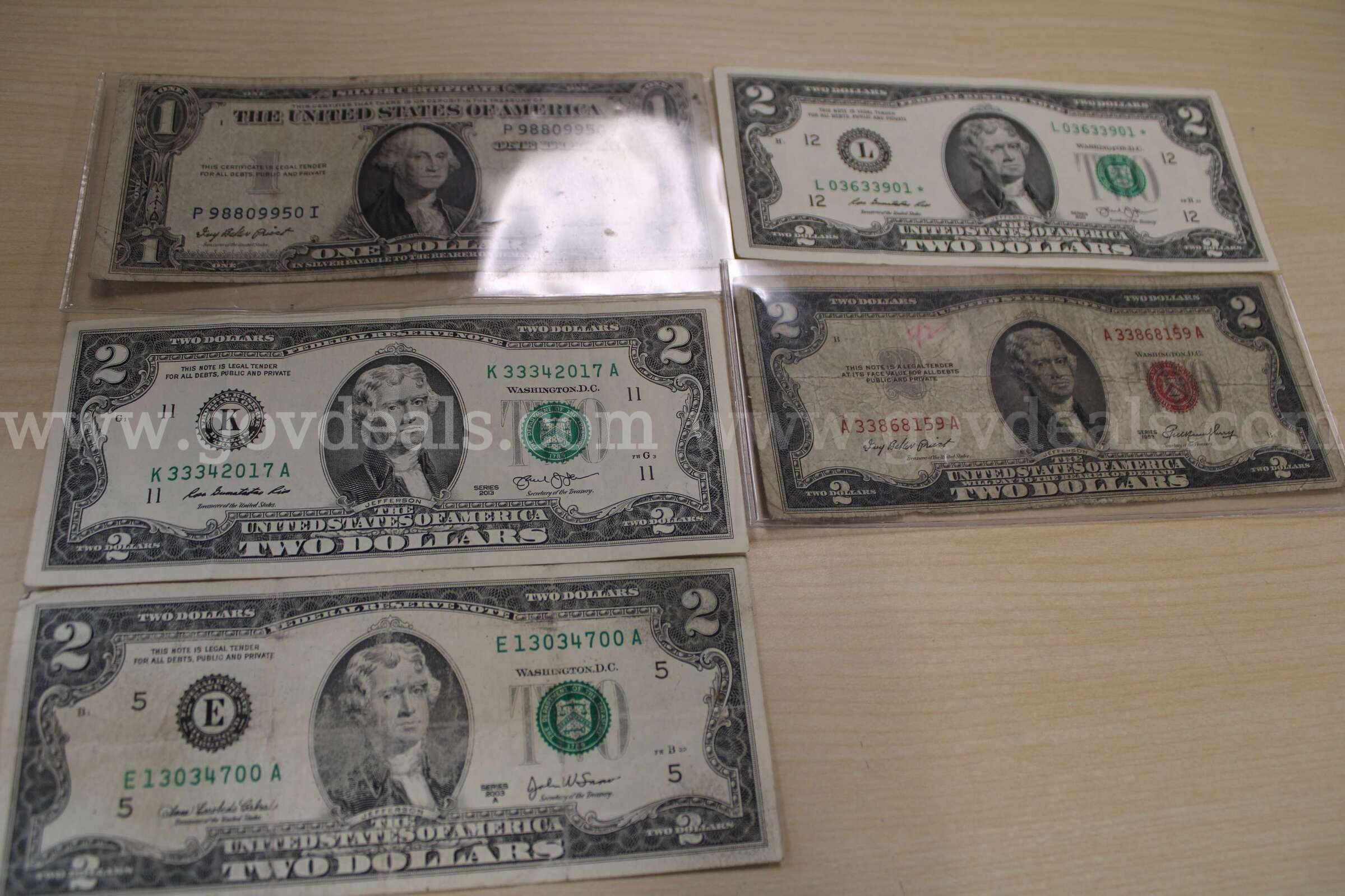 $2 BILL (4); $1 BILL (1); $1 COIN (2); PENNY (1)   Government Surplus Auction - Photo #2